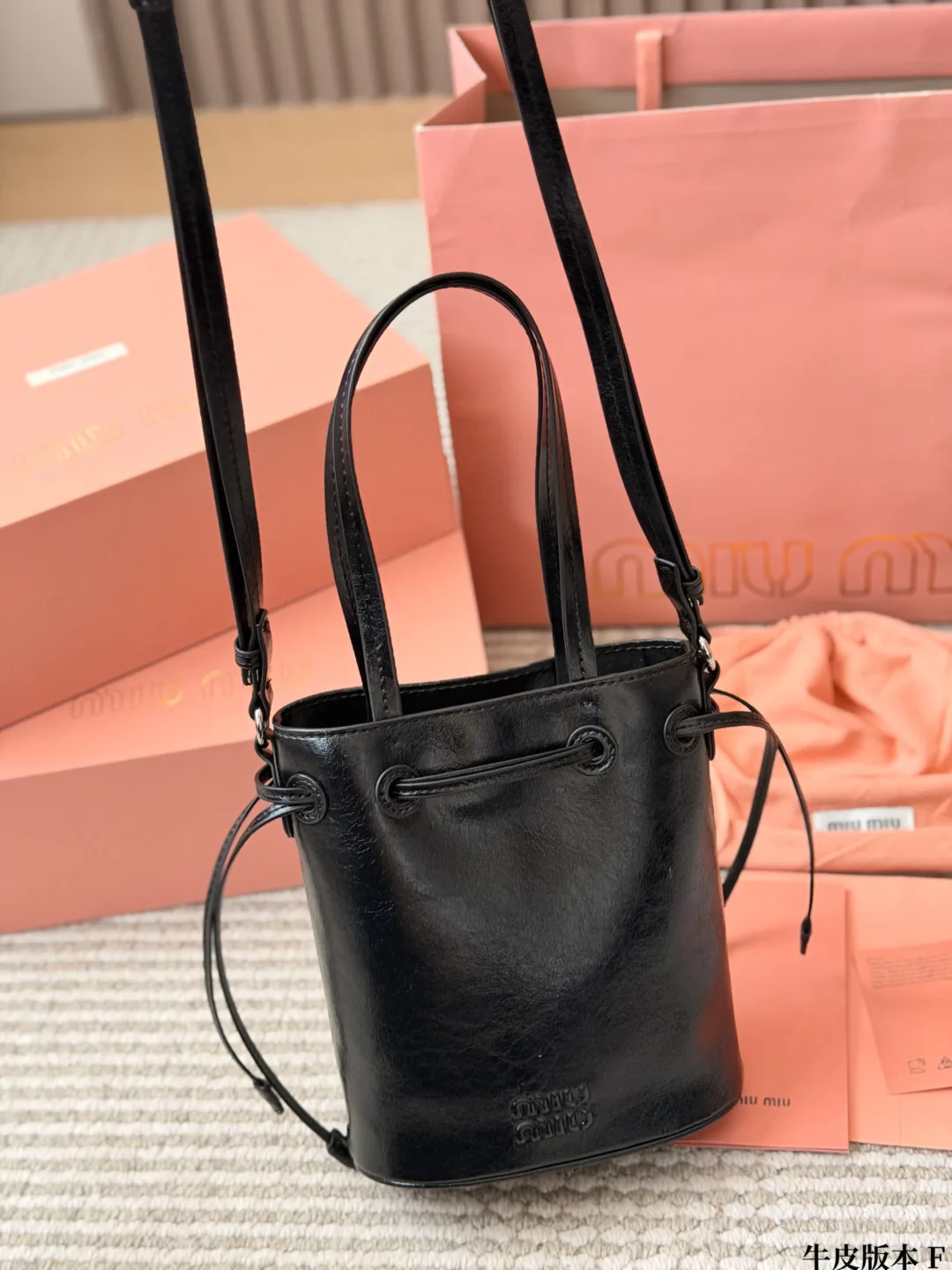 Miu Miu Cowhide Bucket Bag in Black · view 4