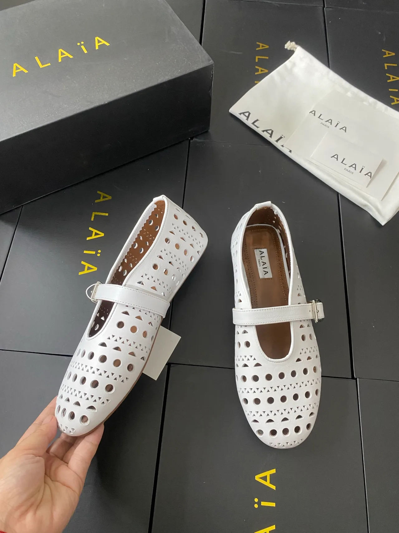 Alaia Cowhide Sheepskin Round-Toe Buckle Ballet Flats in White · view 5