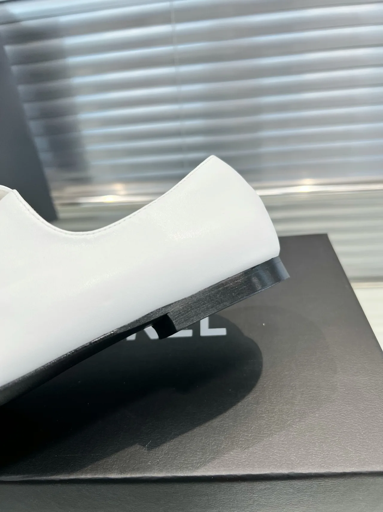 Chanel Cap-toe loafers in Black / Cream · view 7