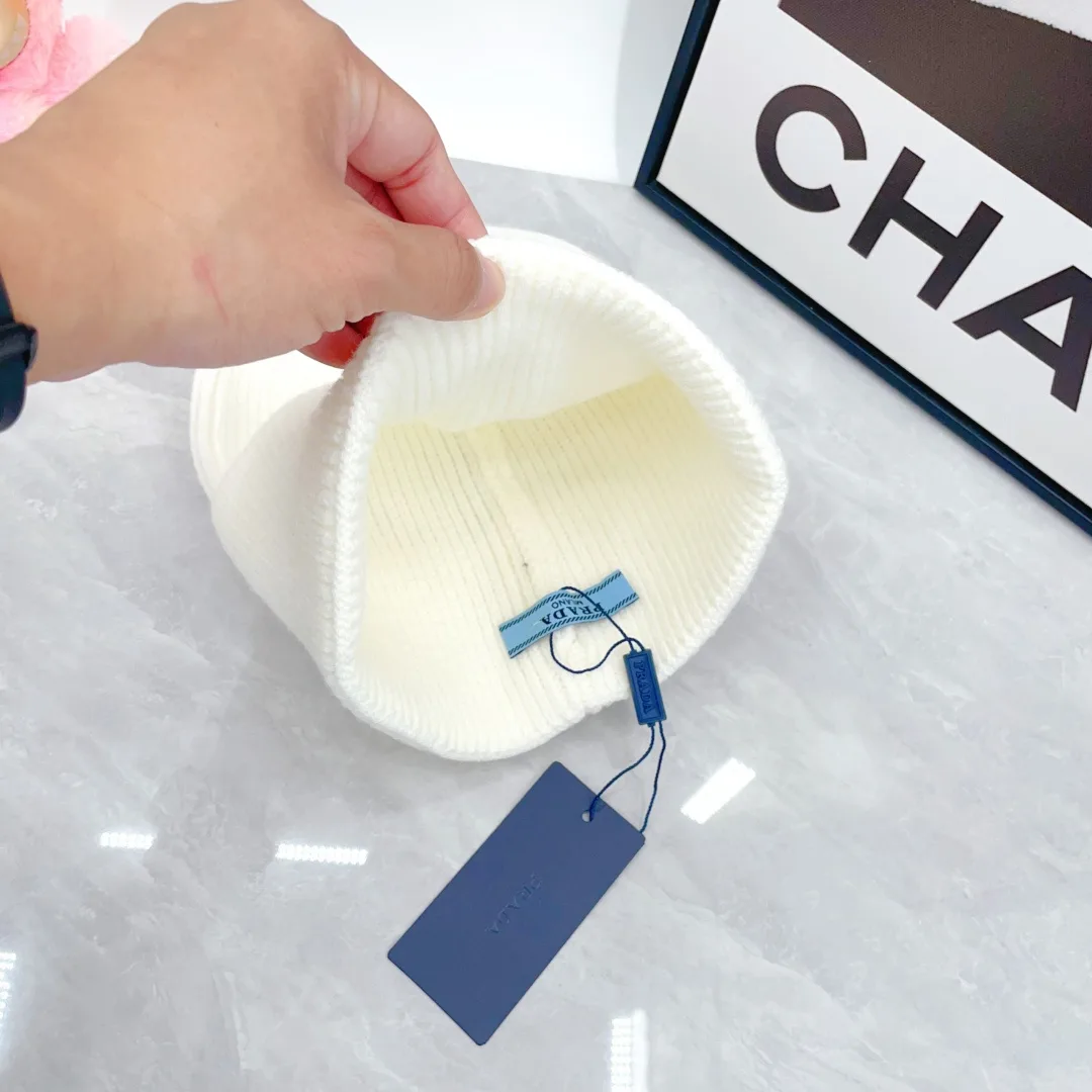 Prada Wool Triangle Logo Knit Beanie in White · view 7