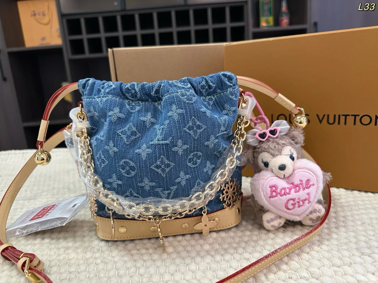 Louis Vuitton Denim Bucket Bag in Blue / Grey / Pink / Beige · view 1