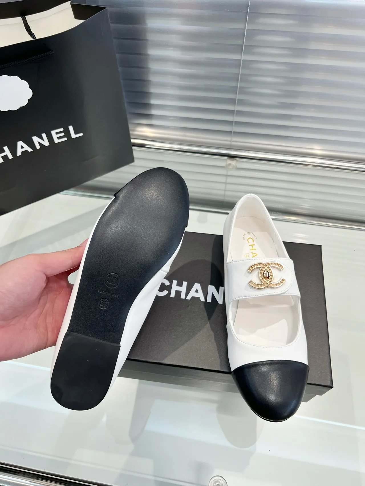 Chanel Cap-toe loafers in Black / Cream · view 4