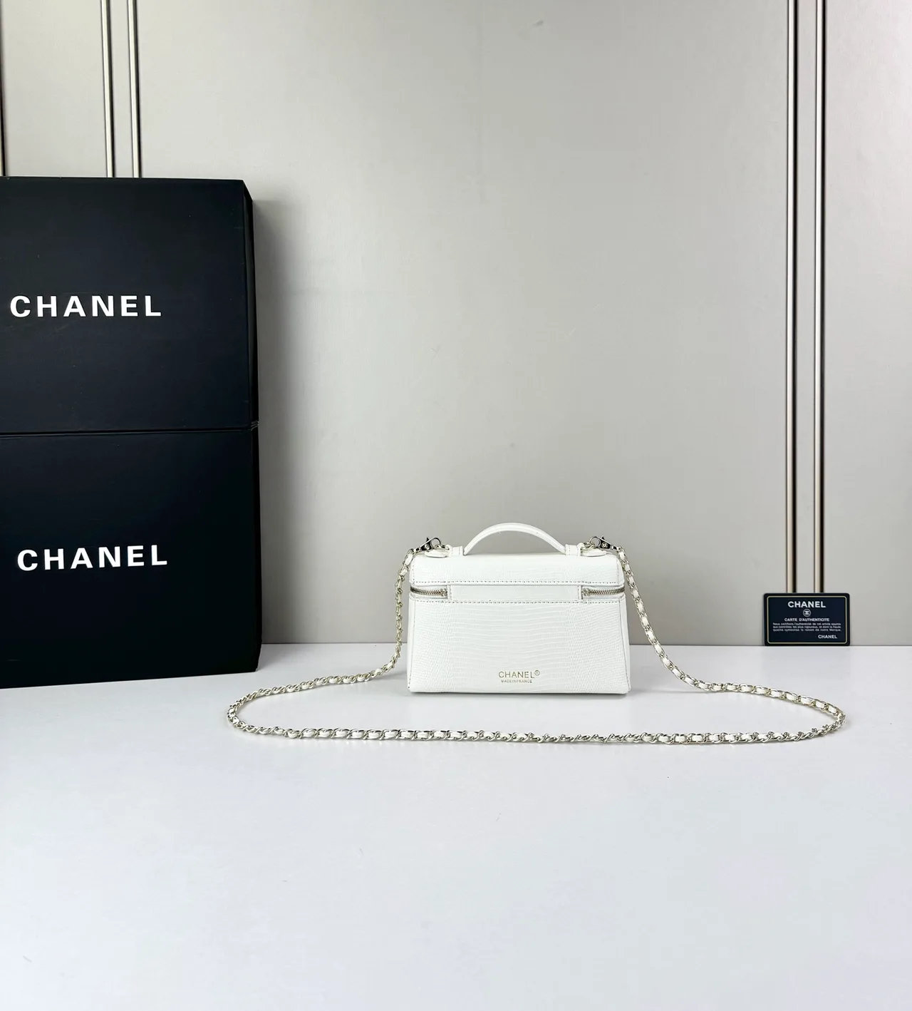 Chanel Cowhide Glossy Top-Handle Clutch in White · view 1