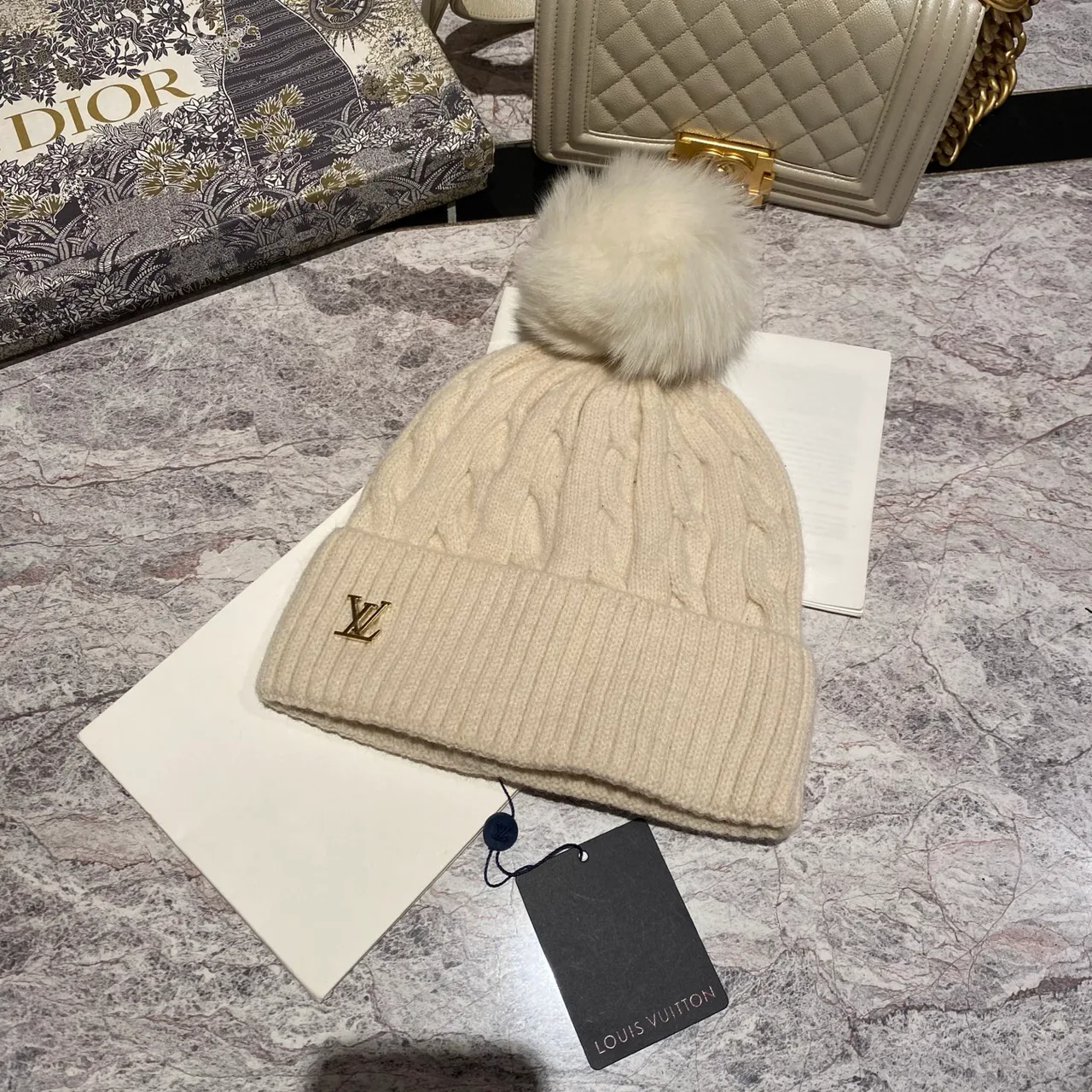 Louis Vuitton Cable knit pom beanie in Black & White & Blue & Burgundy & Cream & Grey & Brown & Pink · view 5