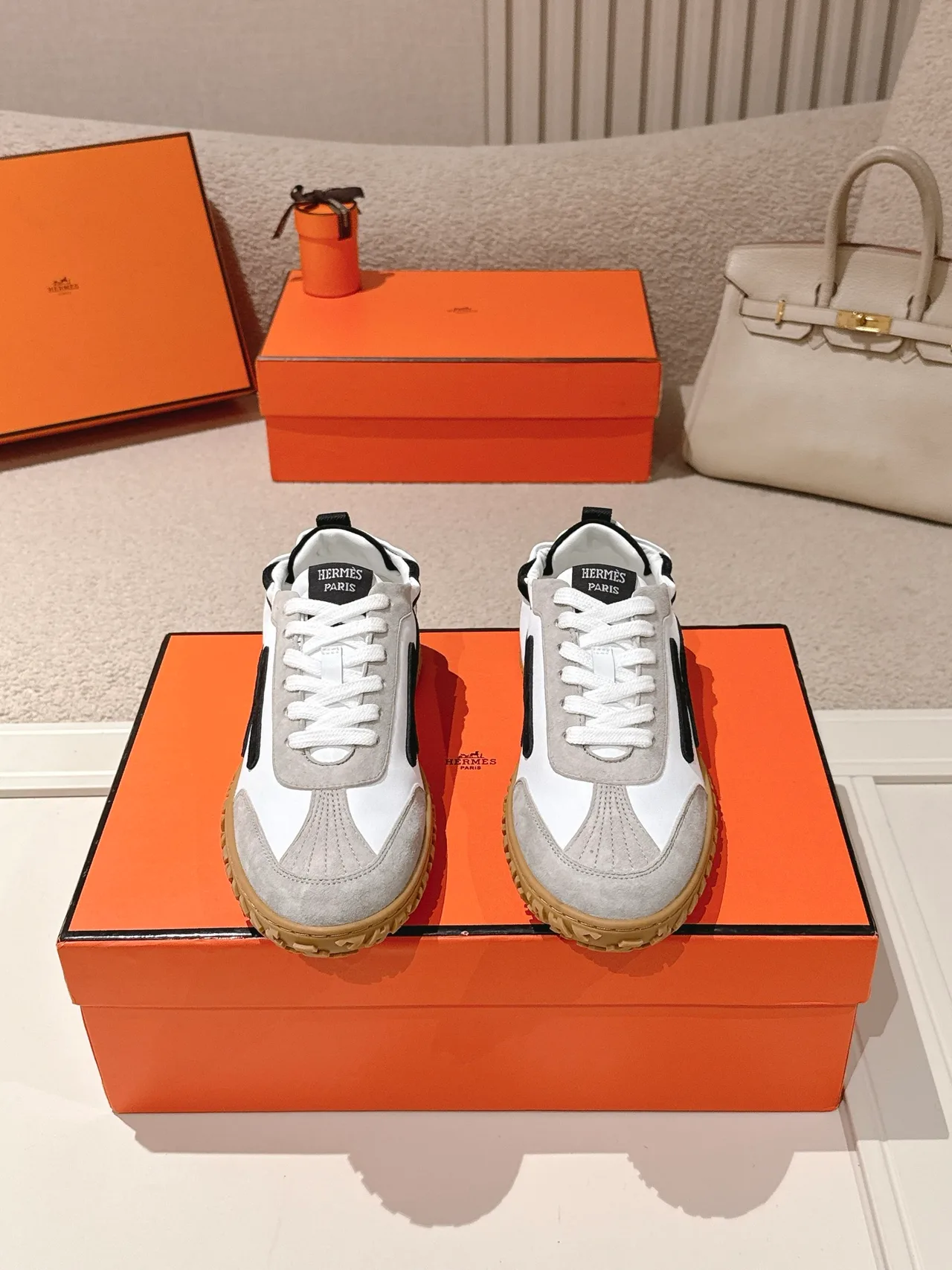 Hermes Sheepskin Suede Striped Round-Toe Sneakers in White · view 1