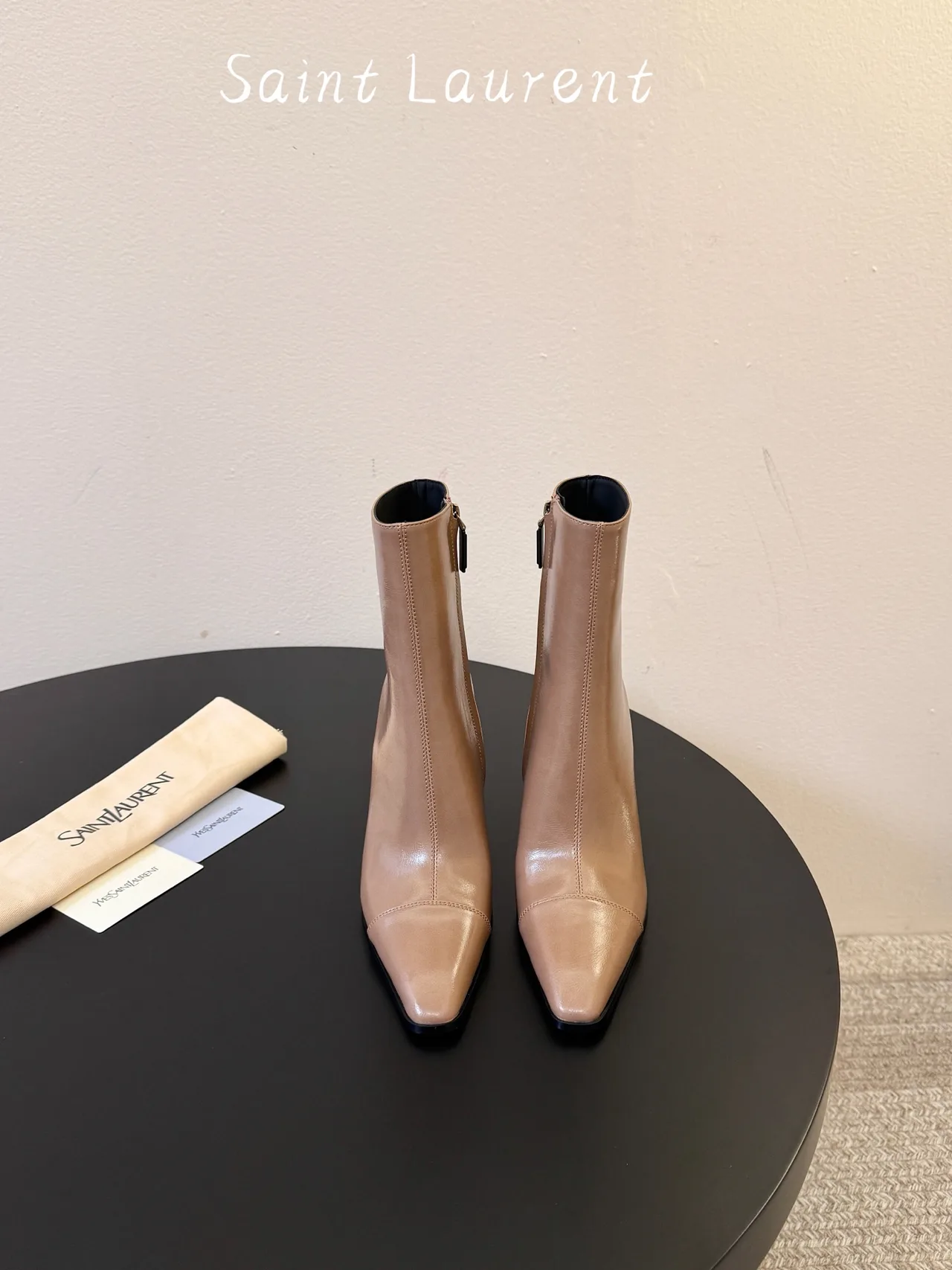Saint Laurent Glossy Pointed-Toe Ankle Boots in Tan · view 1