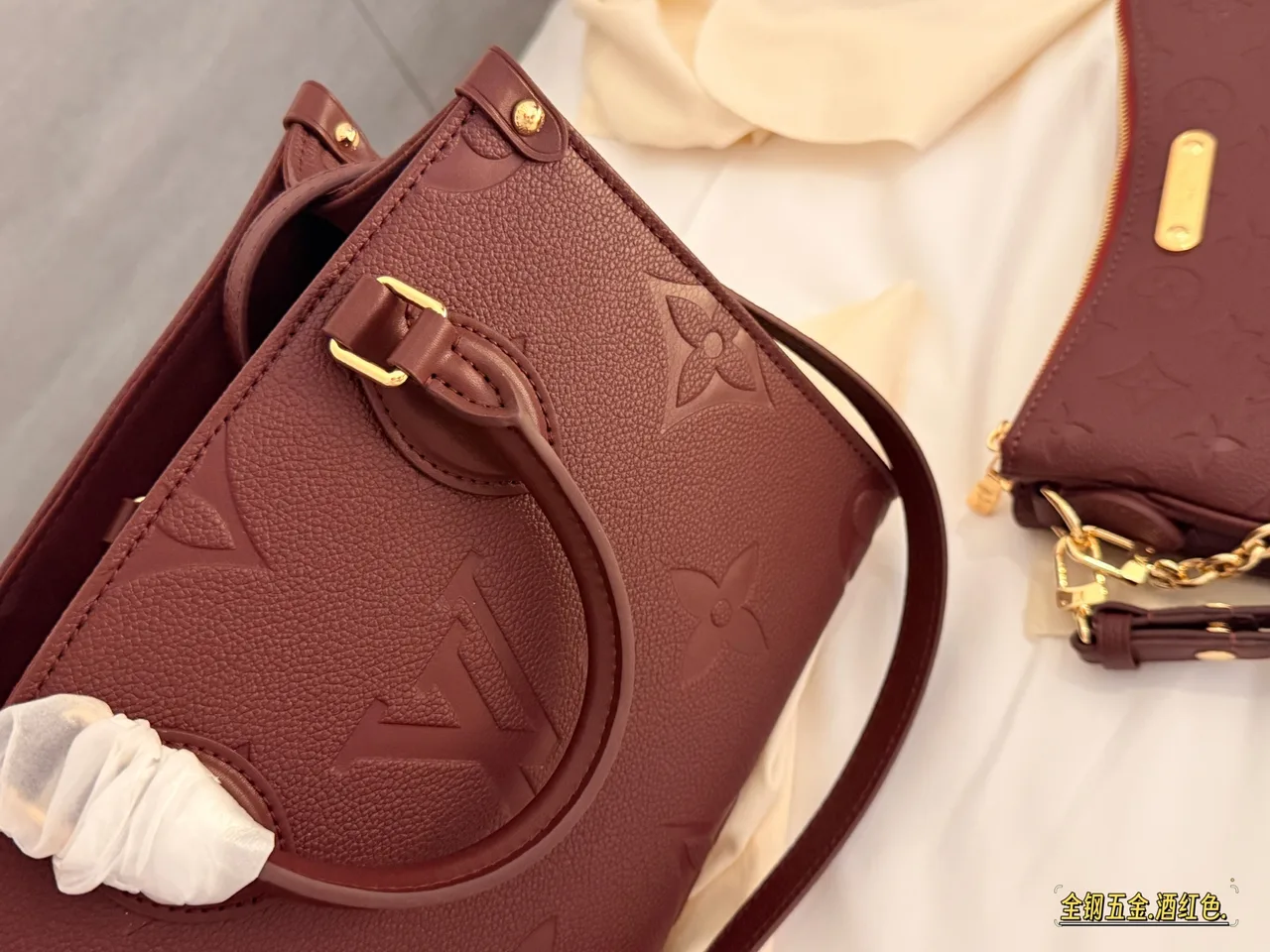 Louis Vuitton OnTheGo Embossed Monogram Zip-Compartment Tote in Burgundy · view 4