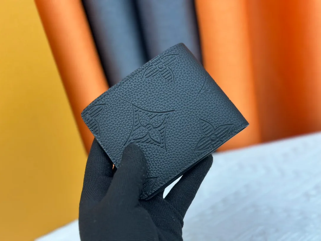 Louis Vuitton Leather Bifold Wallet in Grey · view 2