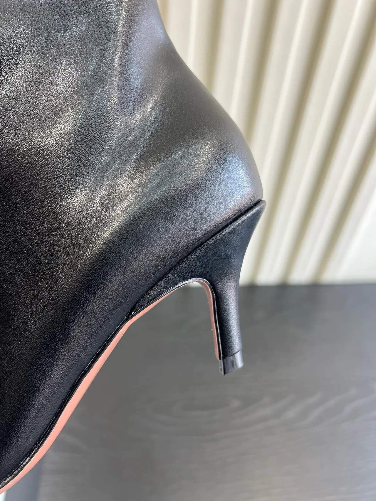 Amina Muaddi Cowhide Glossy Pointed-Toe Knee-High Boots in Black · view 8