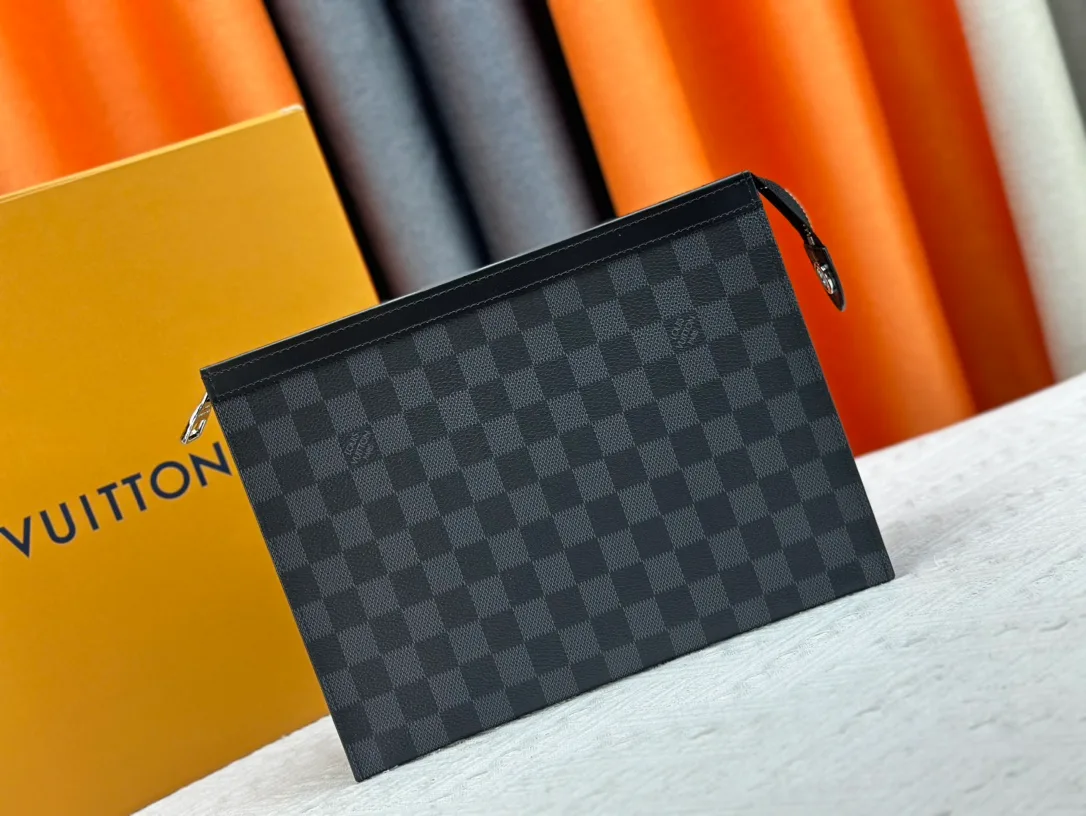 Louis Vuitton Canvas Clutch in Grey · view 1