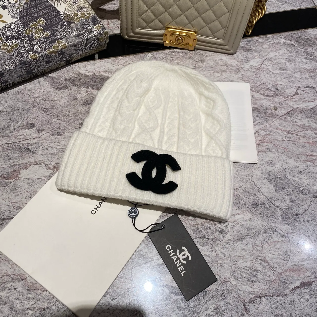 Chanel Cable-Knit Beanie in Black / White / Cream / Tan / Grey · view 6