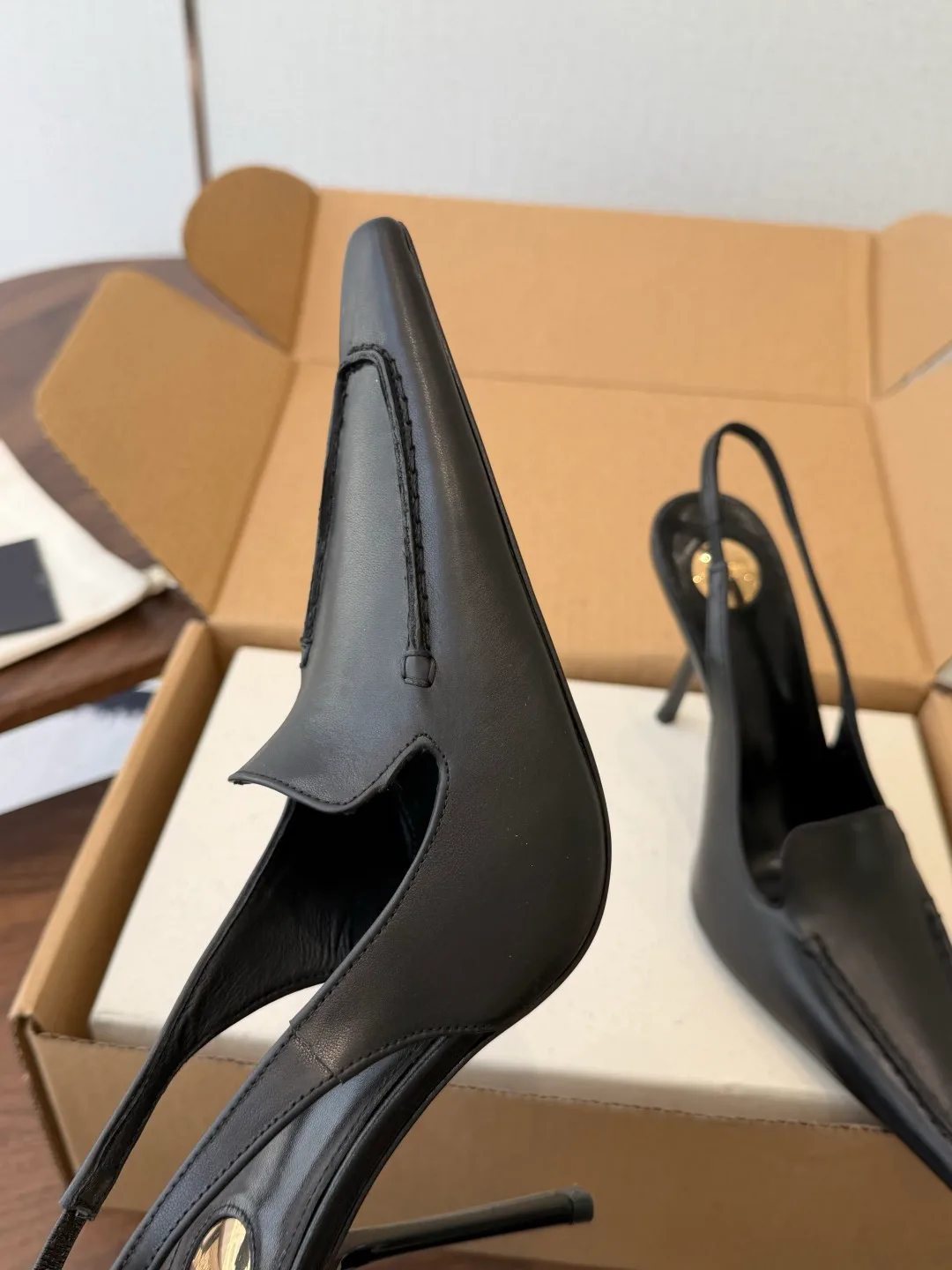 Saint Laurent Cowhide Slingback Heels in Black · view 6