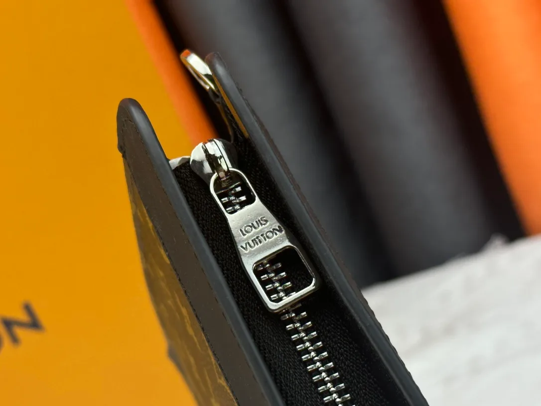 Louis Vuitton Canvas Clutch in Brown · view 7