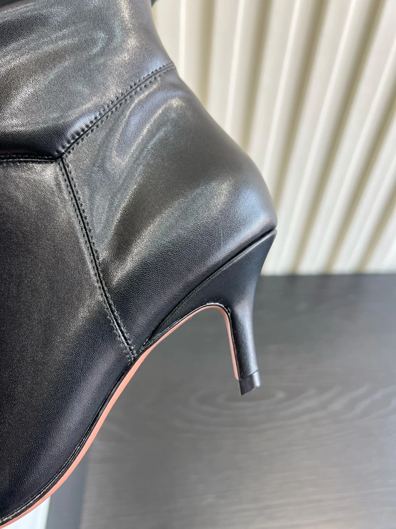 Amina Muaddi Cowhide Glossy Pointed-Toe Boots in Black · view 8
