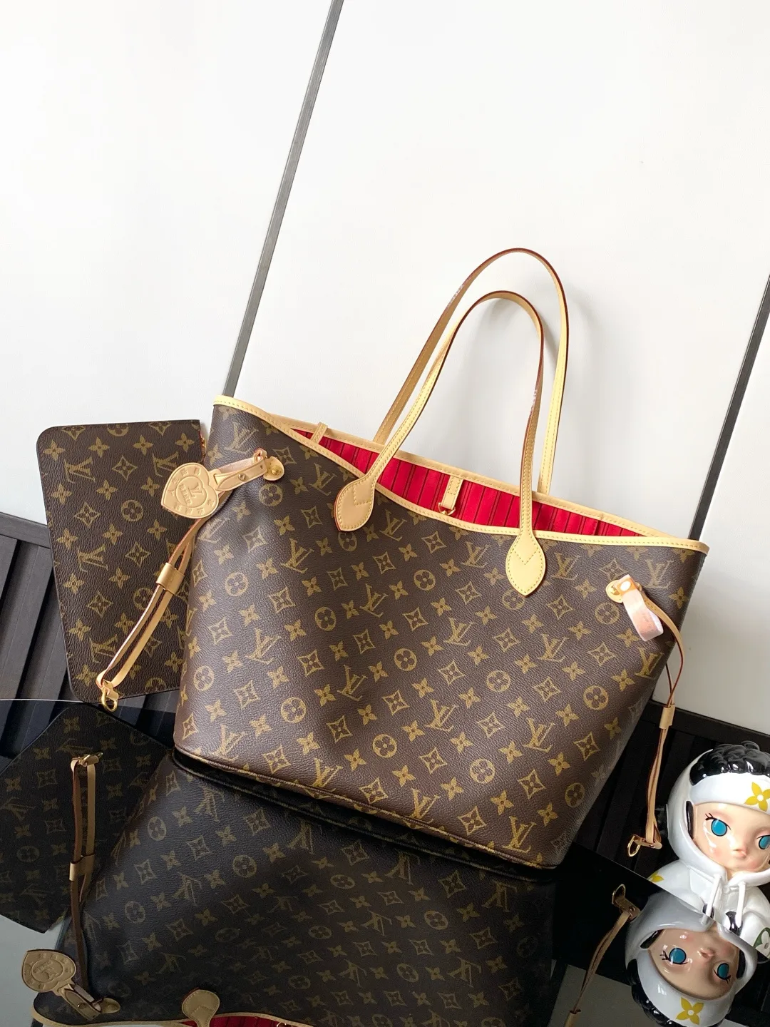 Louis Vuitton Neverfull Tote in Brown · view 1