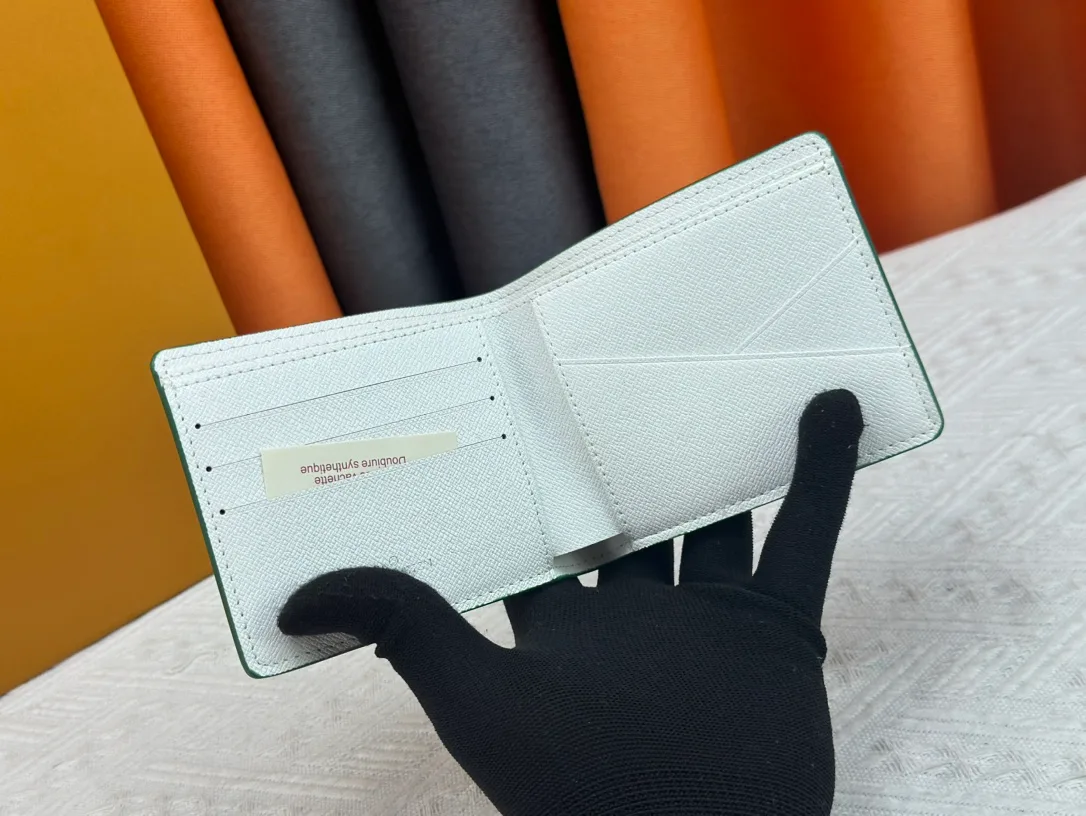 Louis Vuitton Canvas Wallet in Green · view 8