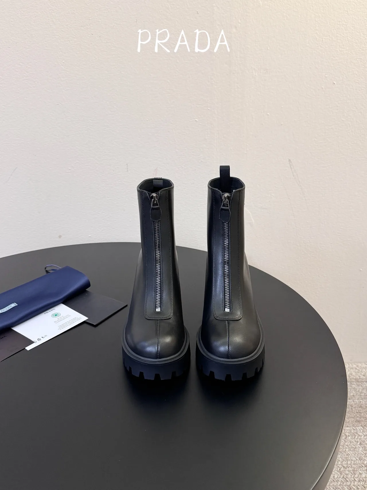 Prada Calfskin Glossy Ankle Boots in Black · view 1