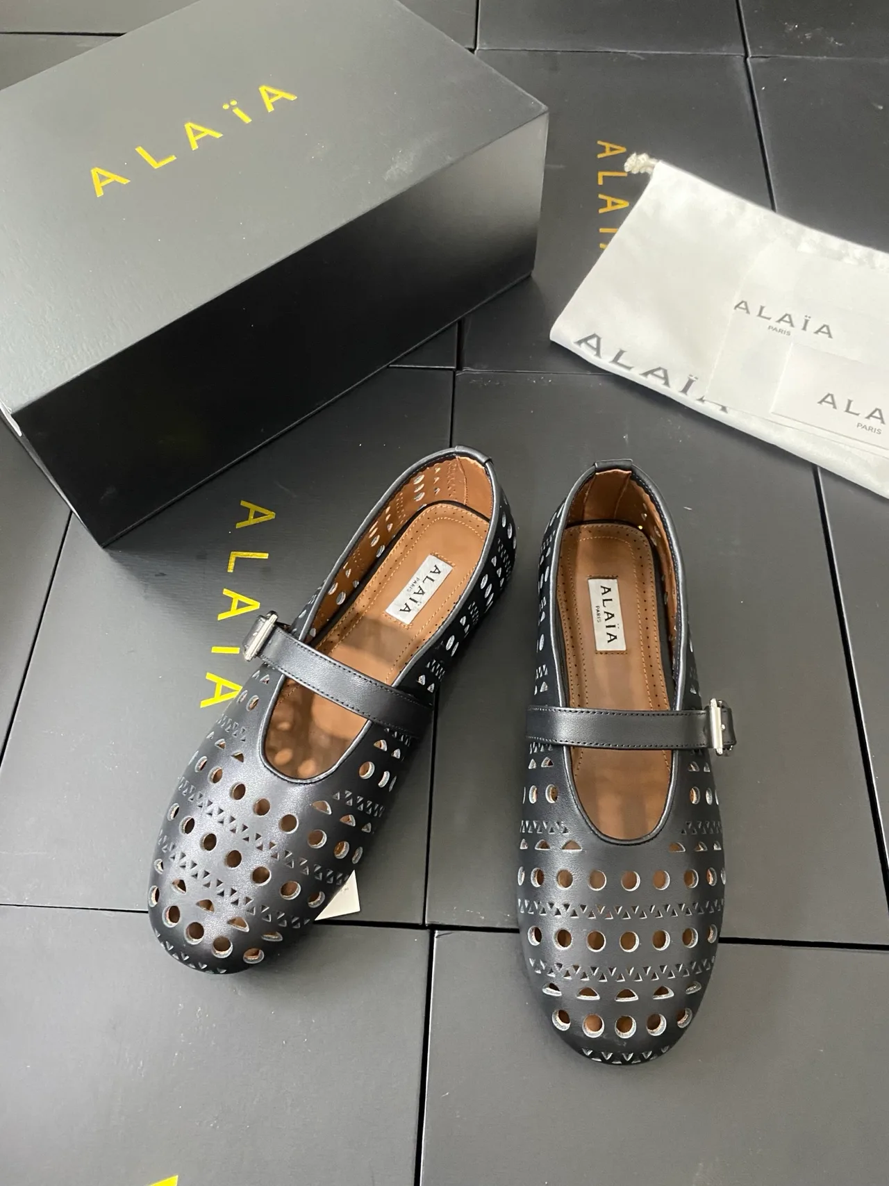 Alaia Cowhide Sheepskin Buckle Studded Mary Jane Flats in Black · view 2