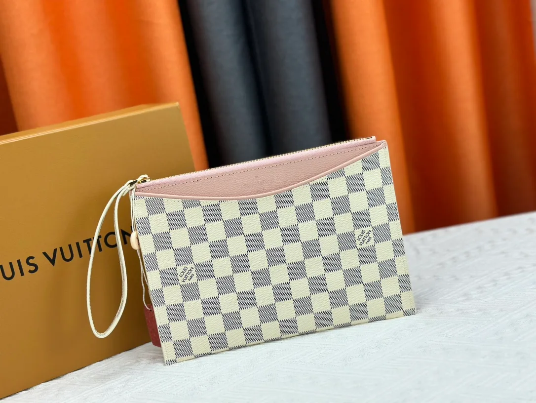Louis Vuitton Calfskin Wristlet Pouch in White · view 1
