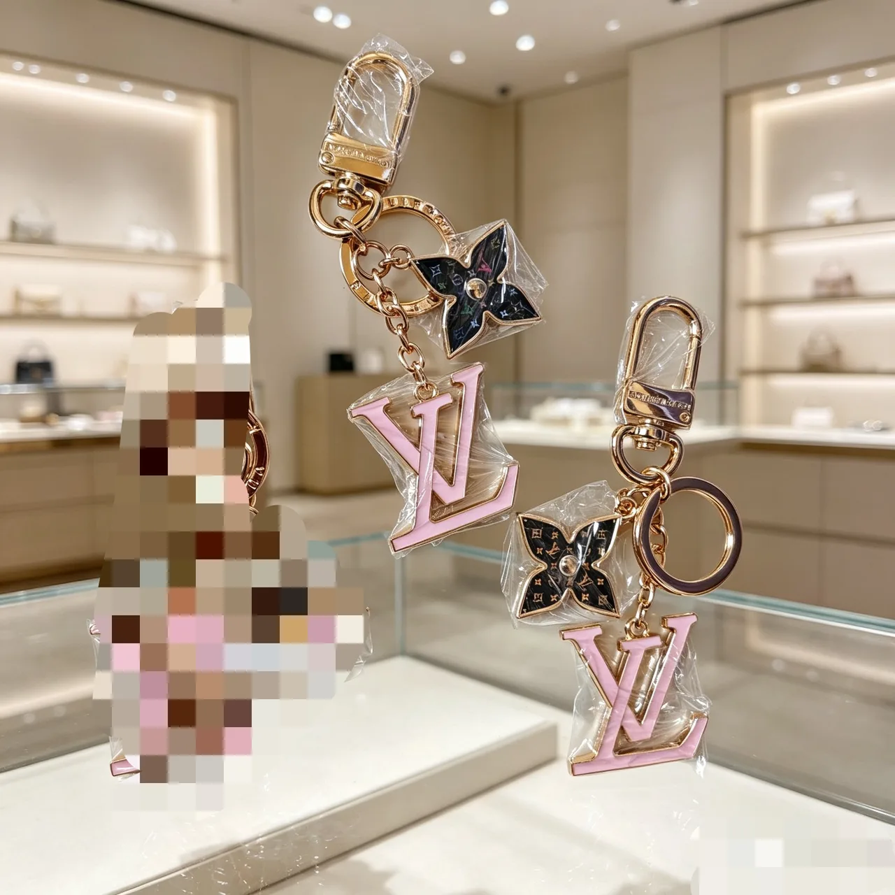 Louis Vuitton Initial and Flower Keychain in Pink · view 1