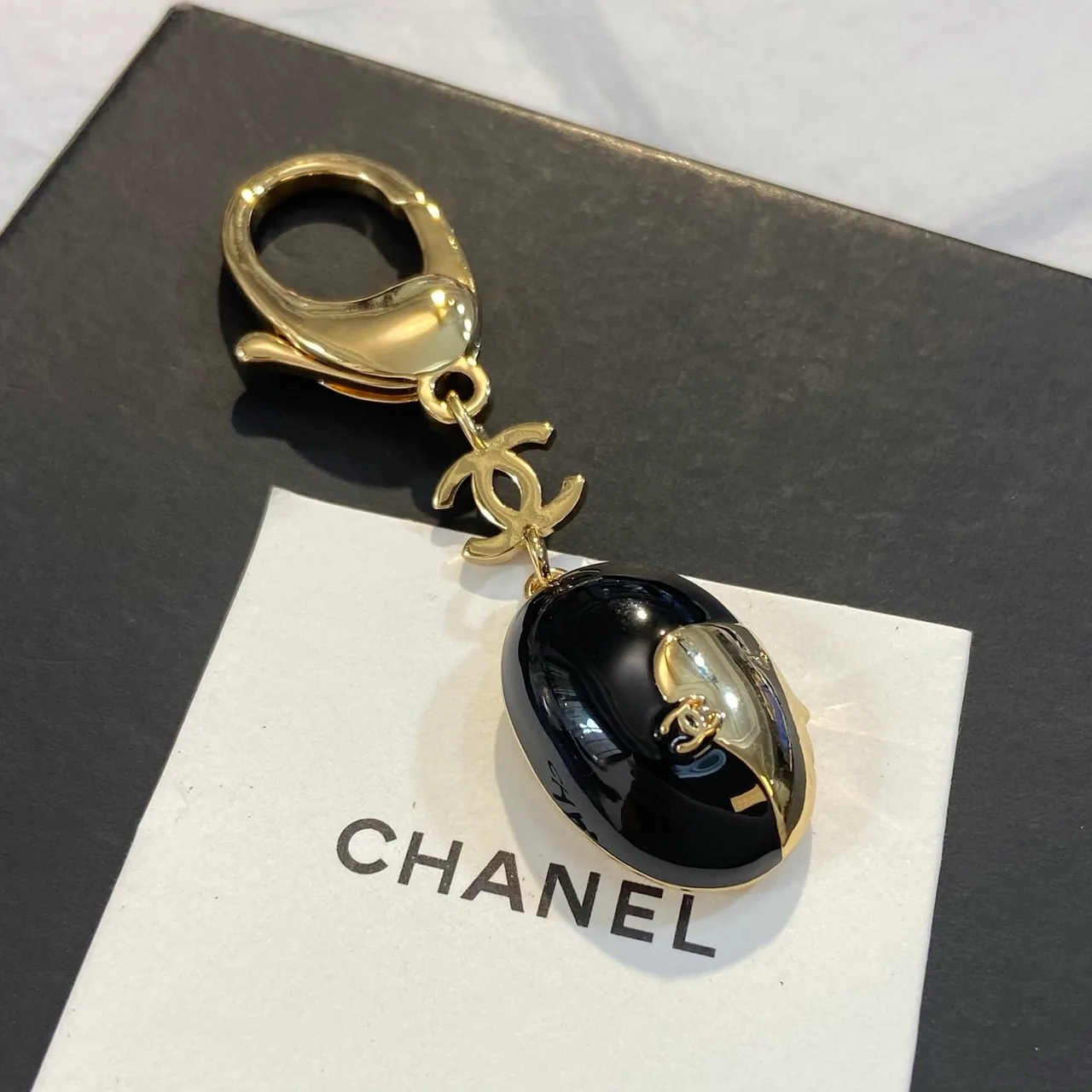 Chanel Face Keychain in Black · view 3