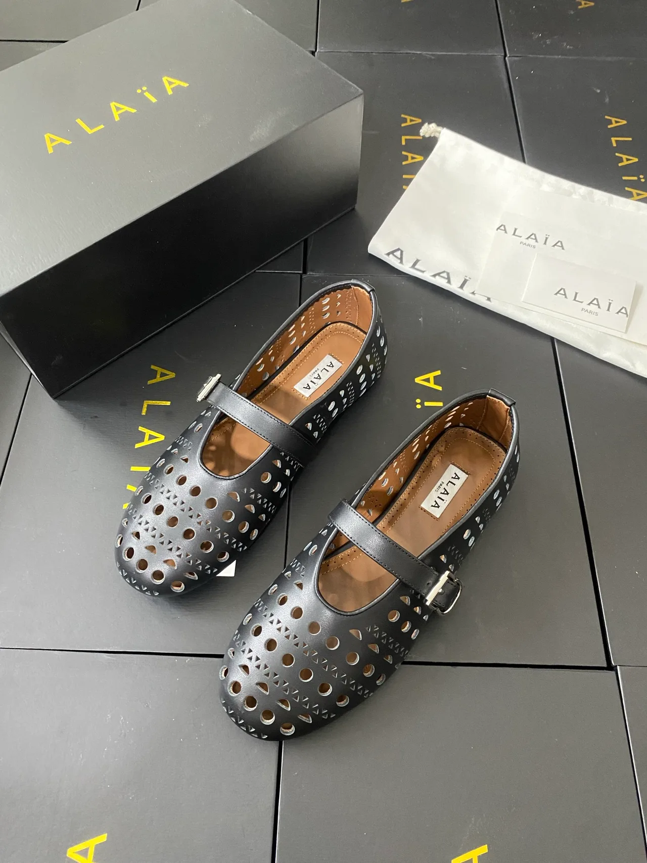 Alaia Cowhide Sheepskin Buckle Studded Mary Jane Flats in Black · view 3