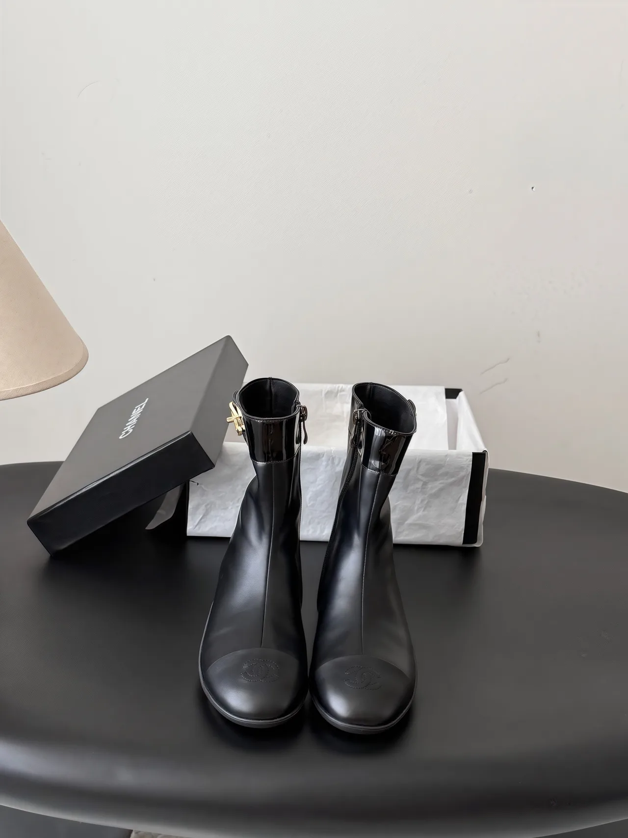 Chanel Cowhide Glossy Round-Toe Boots in Black · view 1