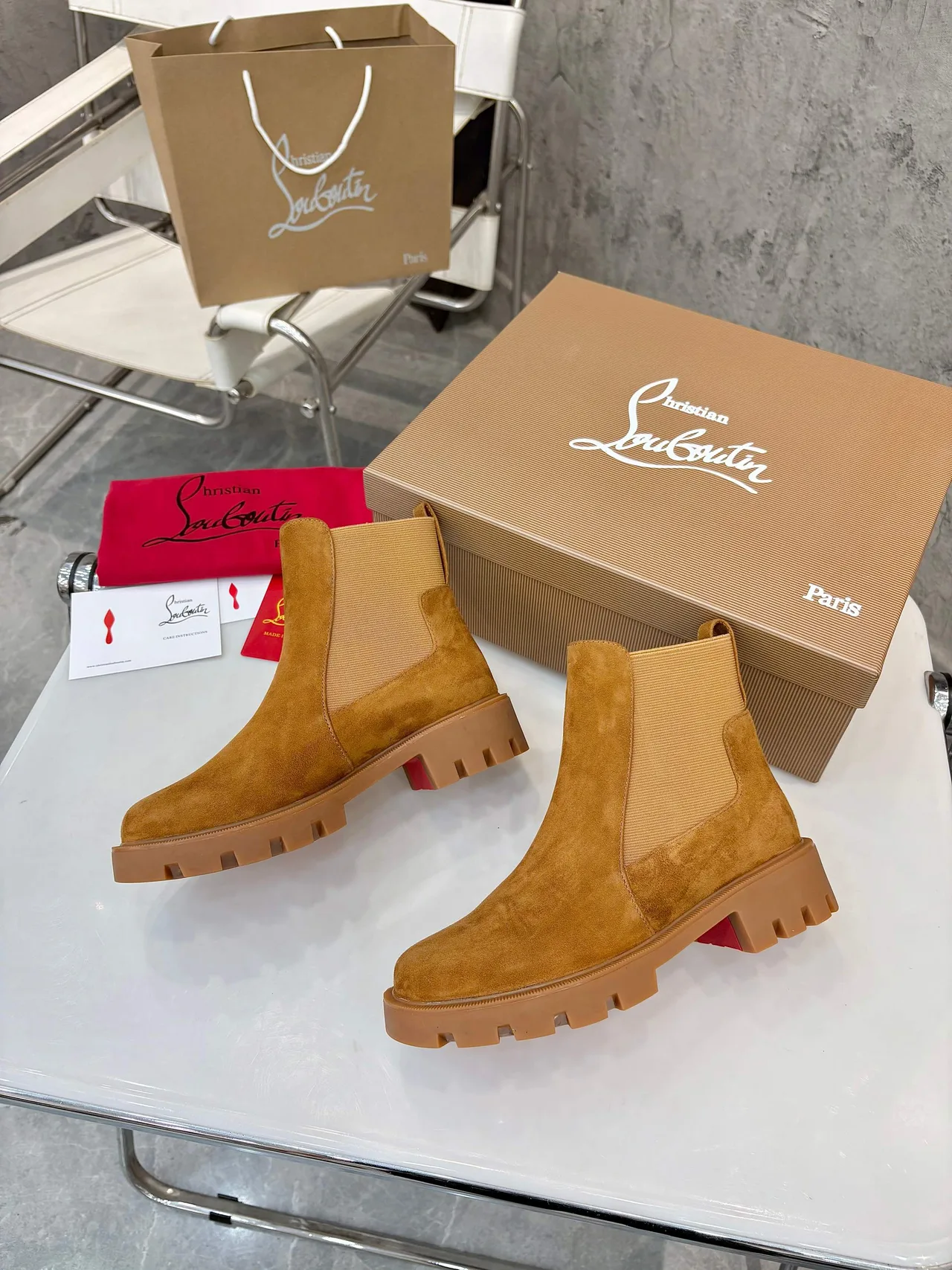 Christian Louboutin Chelsea ankle boots in Black & Brown · view 7