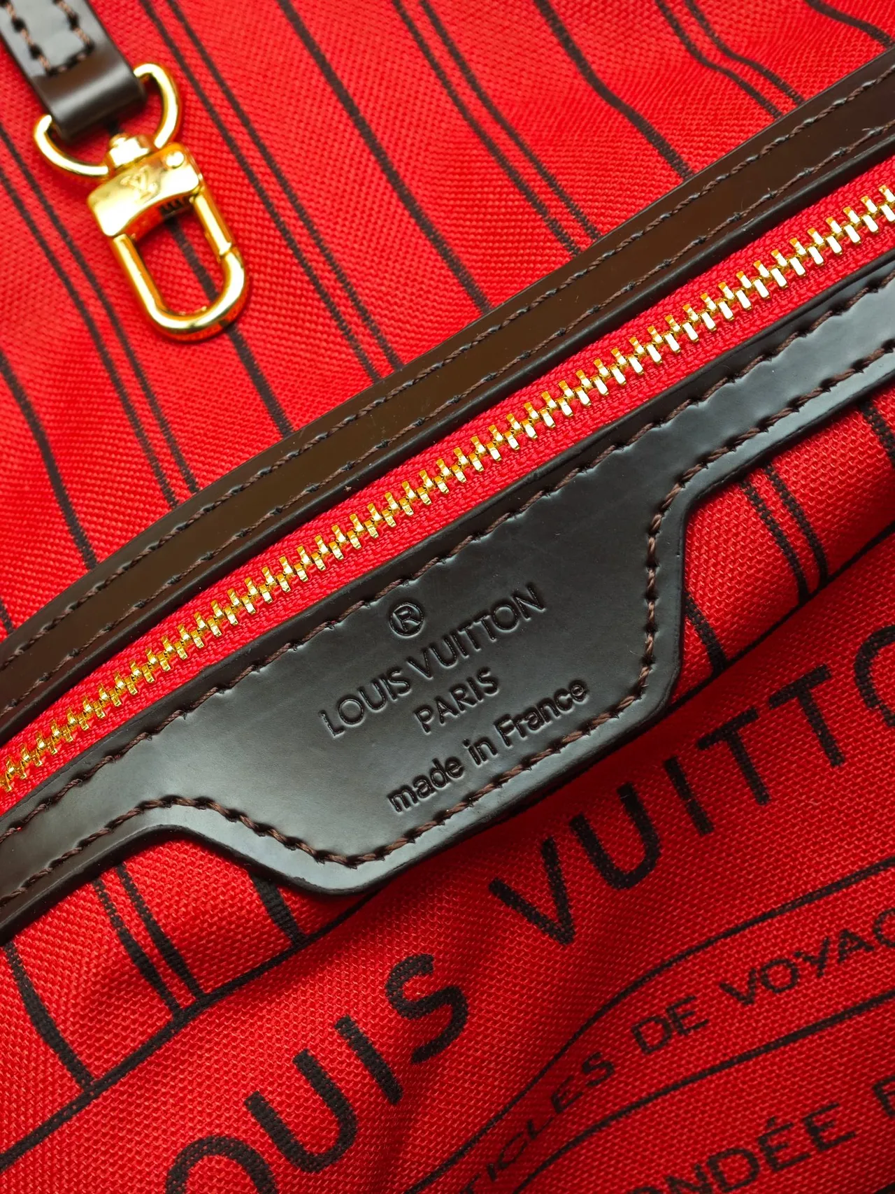Louis Vuitton Neverfull Clutch in Brown · view 8