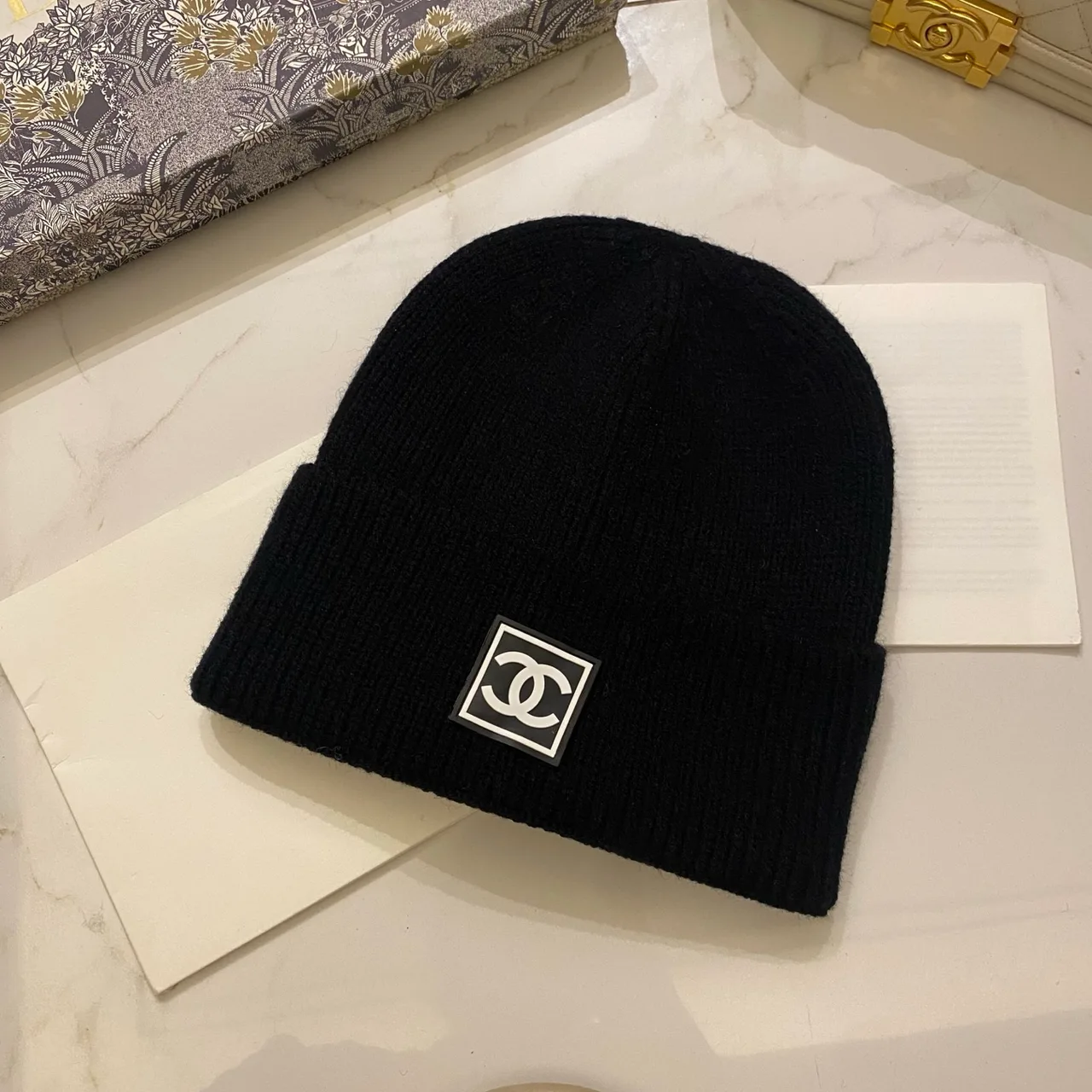 Chanel Beanie in Black & White & Grey & Beige & Tan & Blue & Orange & Yellow & Pink & Burgundy & Red & Brown · view 1