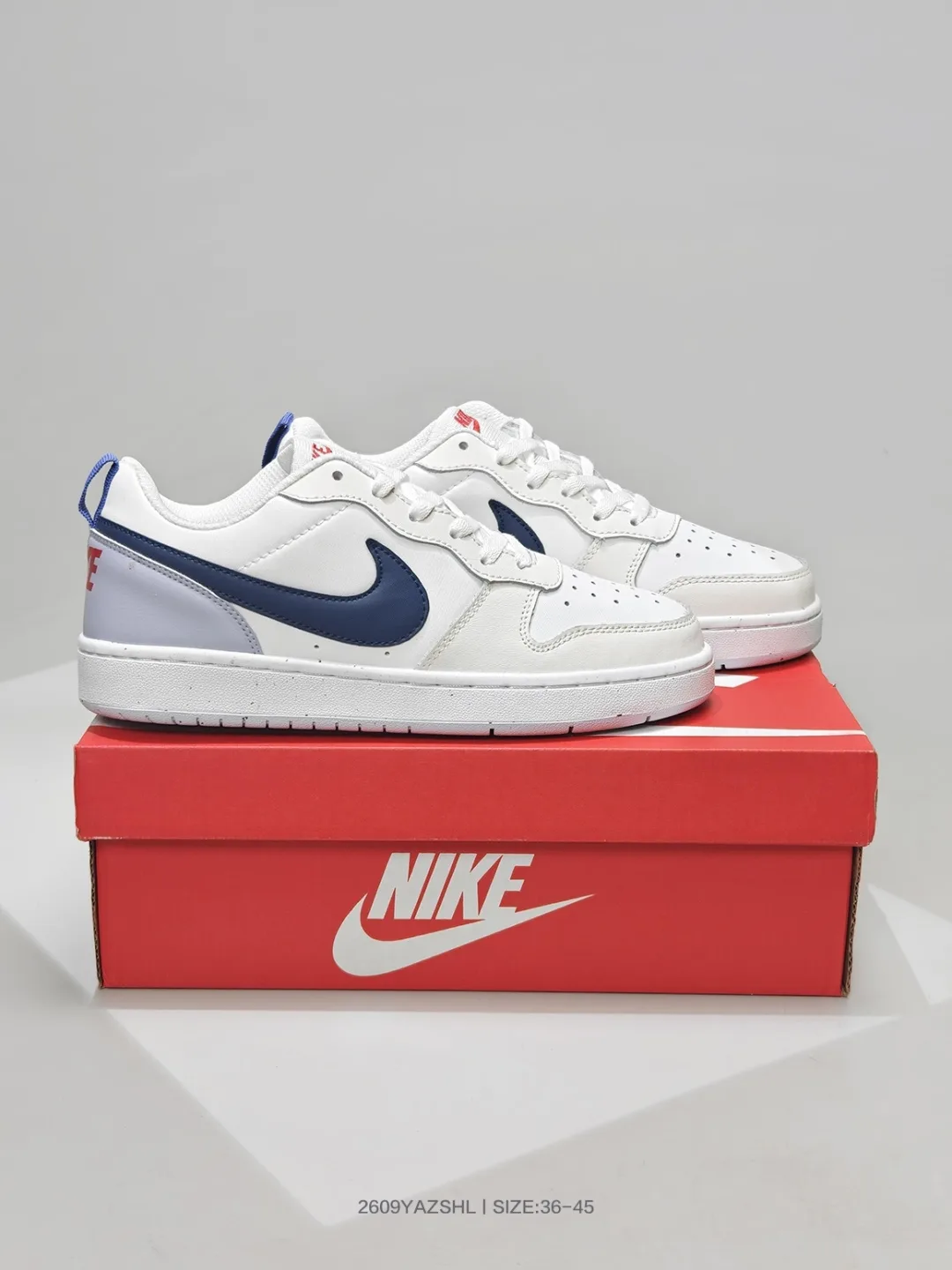 Nike Dunk Low Sneakers in Black & White & Blue · view 6