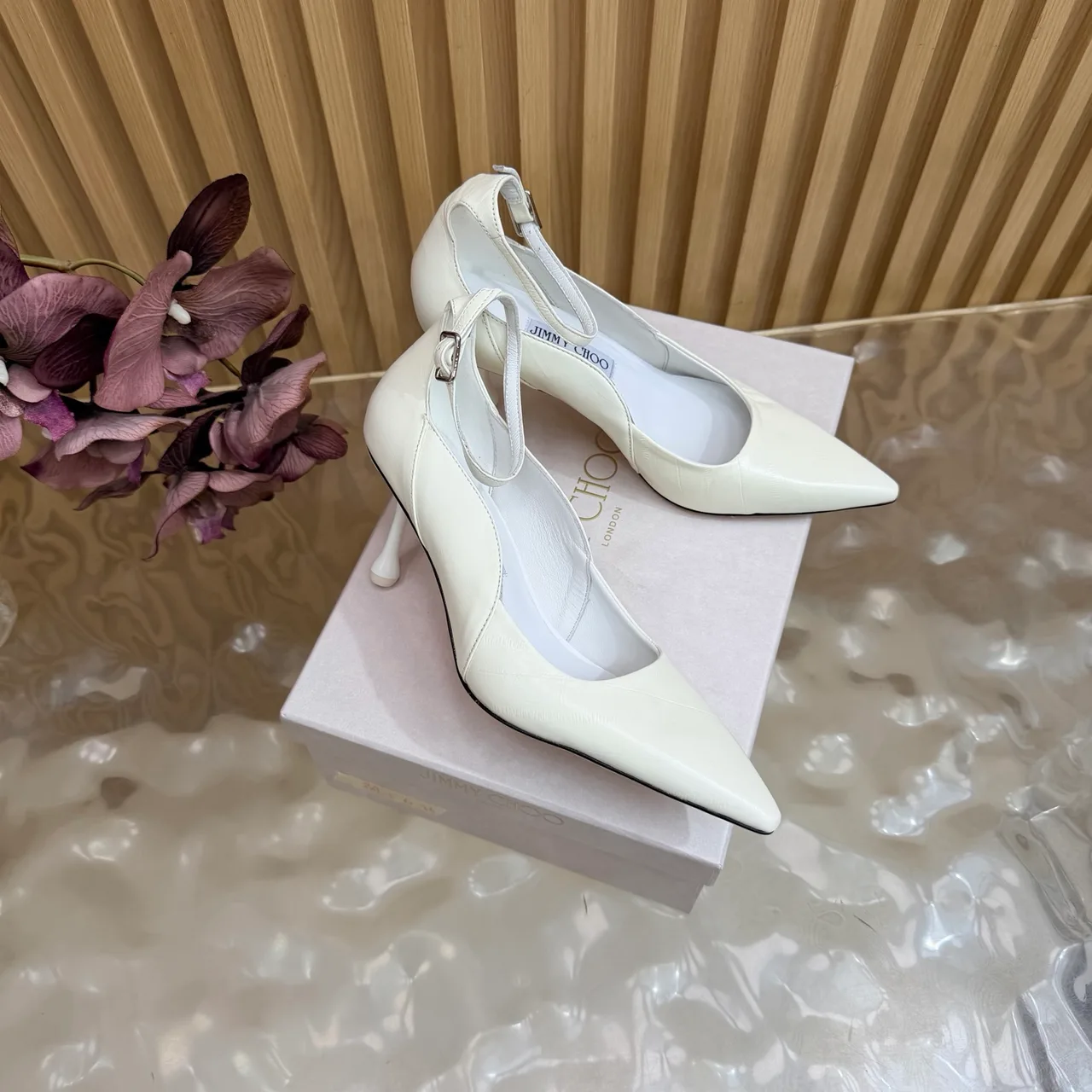 Jimmy Choo Cowhide Glossy Pointed-Toe Pointed Heel Pumps in White · view 3