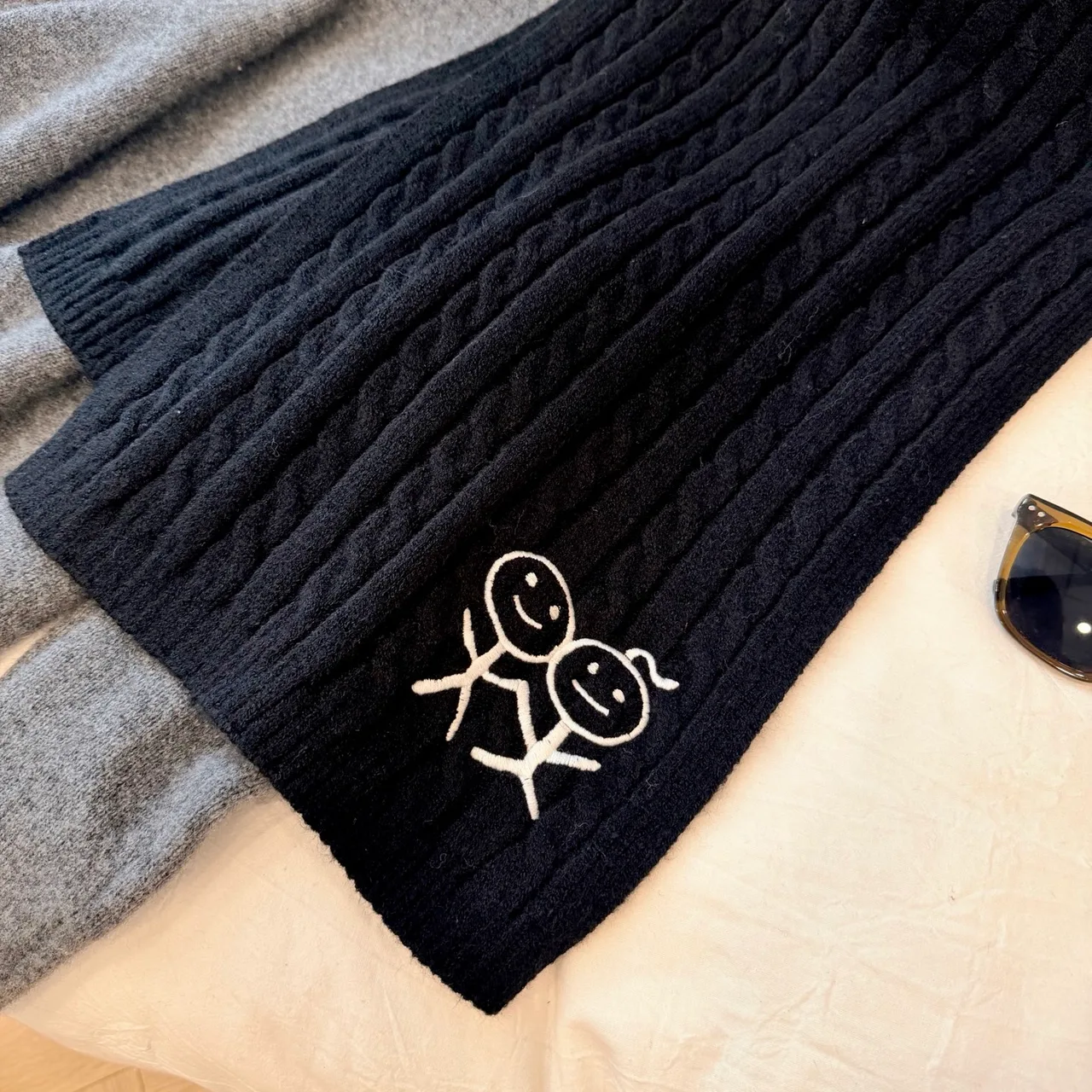 Embroidered Stick-Figure Ribbed Scarf in Black · view 7