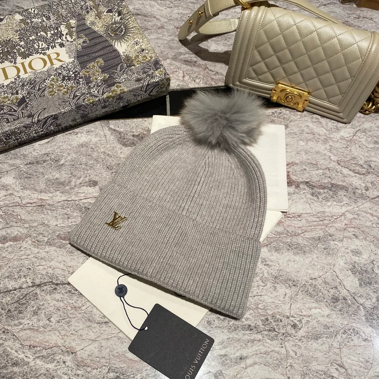 Louis Vuitton Pom-Pom Beanie in Black & White & Blue & Pink & Beige & Grey & Cream & Burgundy & Red & Tan · view 6