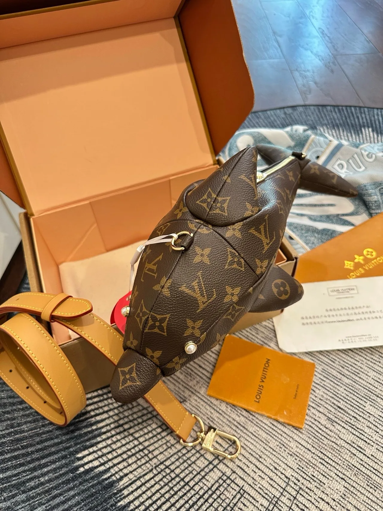 Louis Vuitton Dolphin-Shaped Bag in Brown · view 3