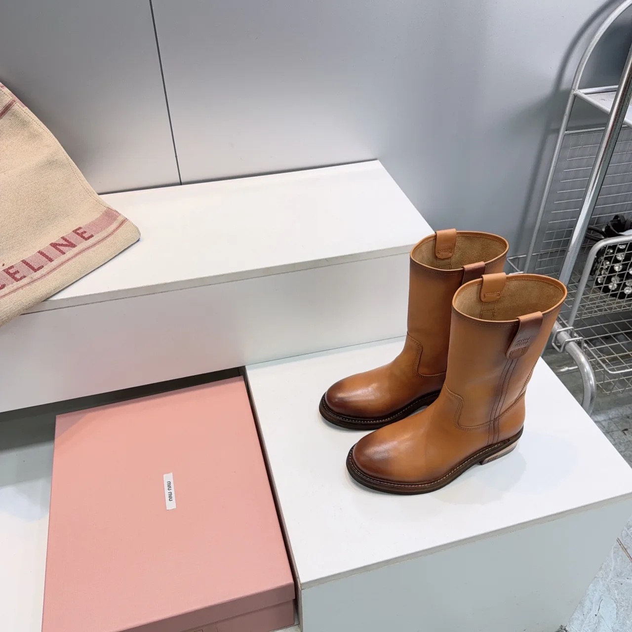 Miu Miu Cowhide Smooth Round-Toe Mid-Calf Boots in Brown · view 8