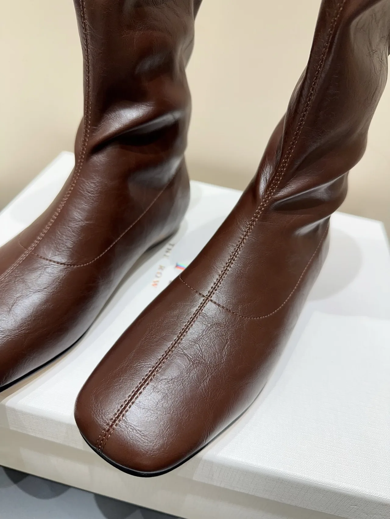 The Row Cowhide Sheepskin Glossy Round-Toe Square-Toe Ankle Boots in Brown · view 4