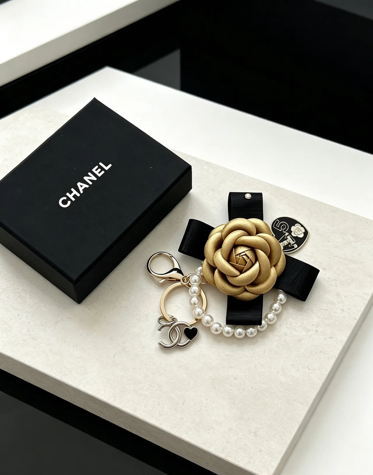 Chanel Glossy Camellia Keychain in Gold · view 5