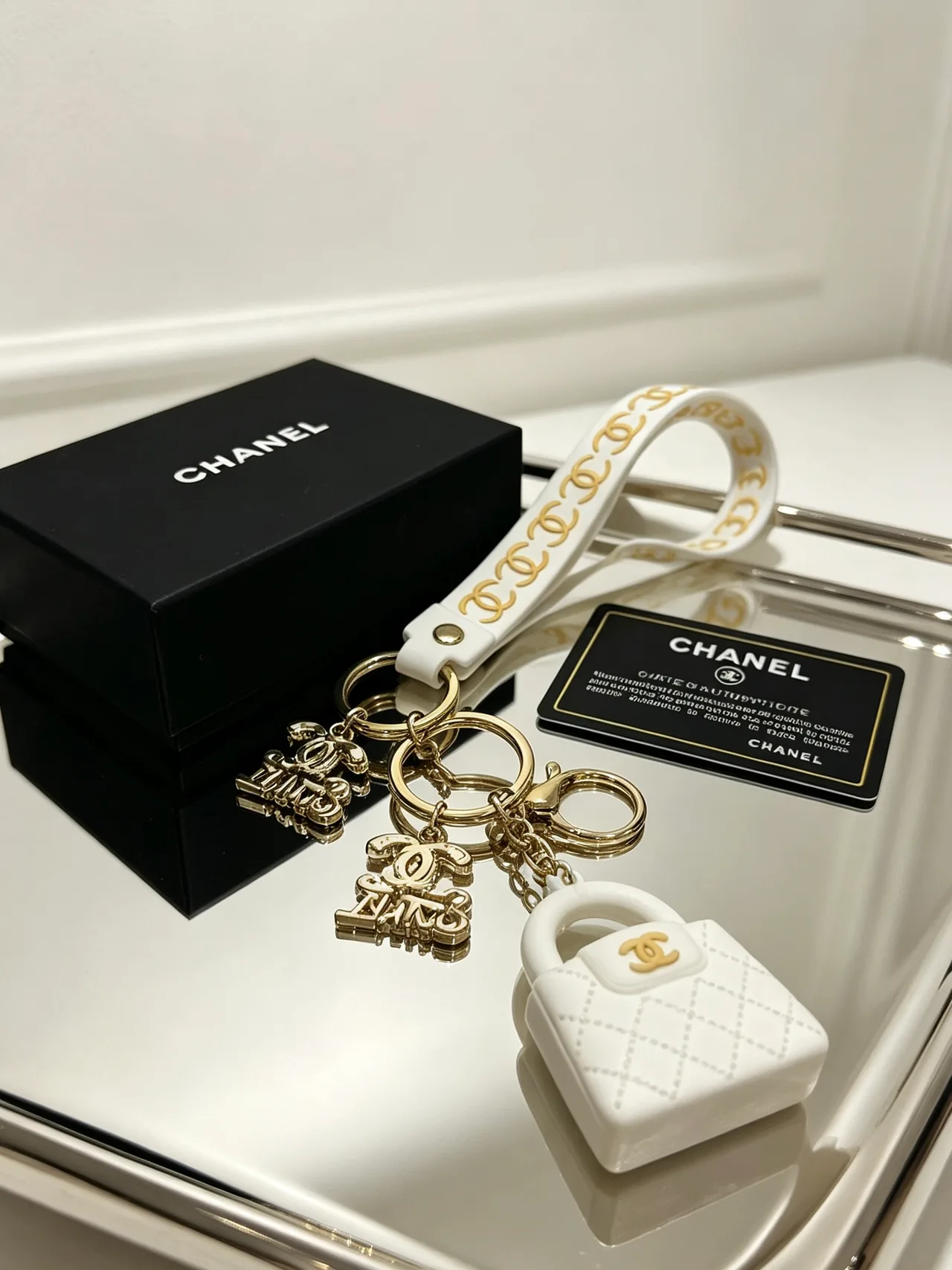 Chanel Quilted Mini Handbag Keychain in White · view 2