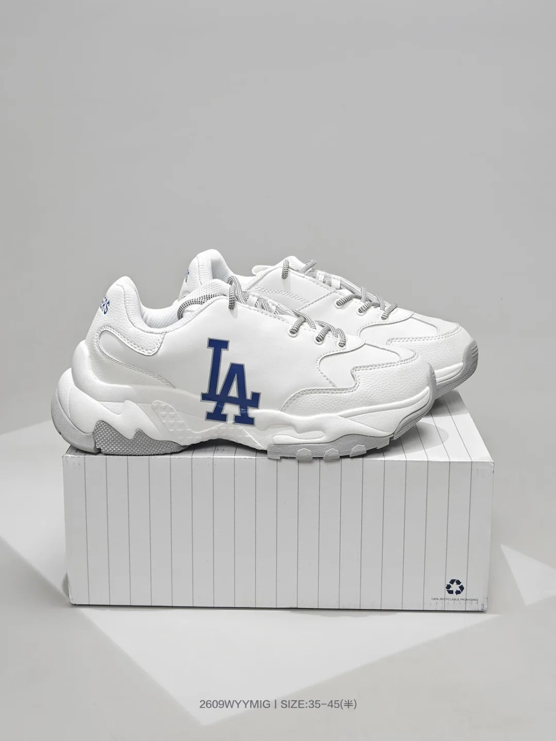 NY and LA Letter Chunky Sneakers in White & Black · view 1