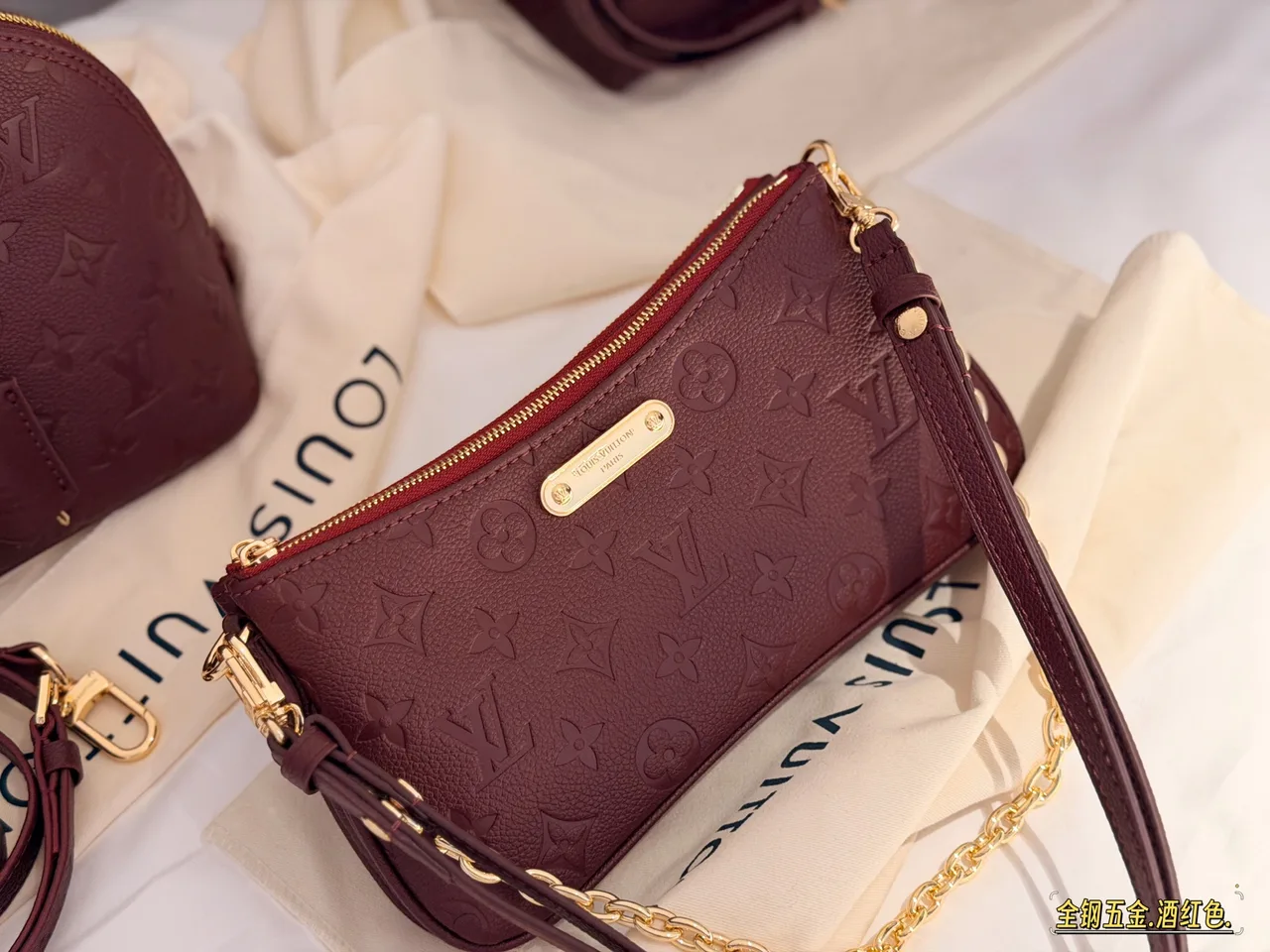 Louis Vuitton Clutch in Burgundy · view 2
