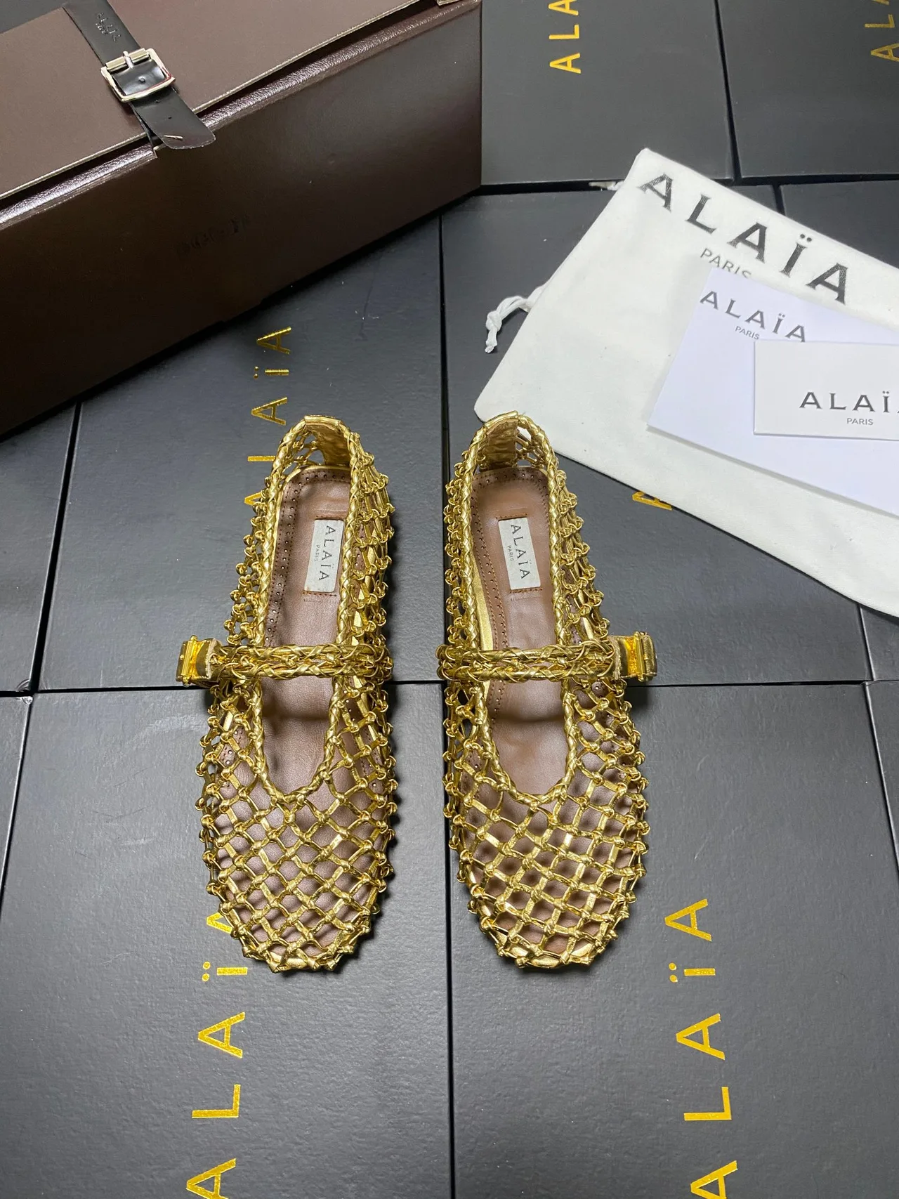 Alaia Cowhide Sheepskin Square-Toe Mary Jane Flats in Gold · view 1