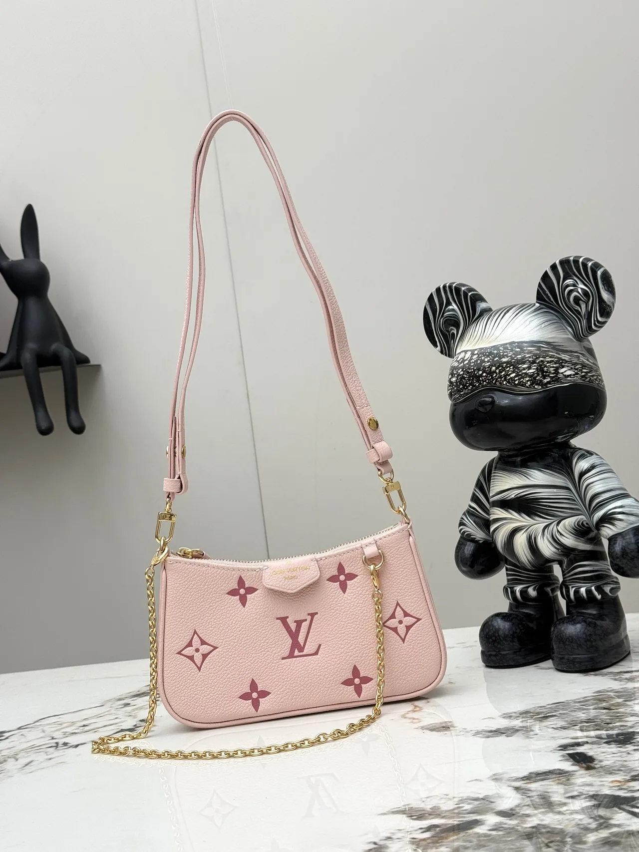 Louis Vuitton Leather Monogram Crossbody Bag in Pink · view 1