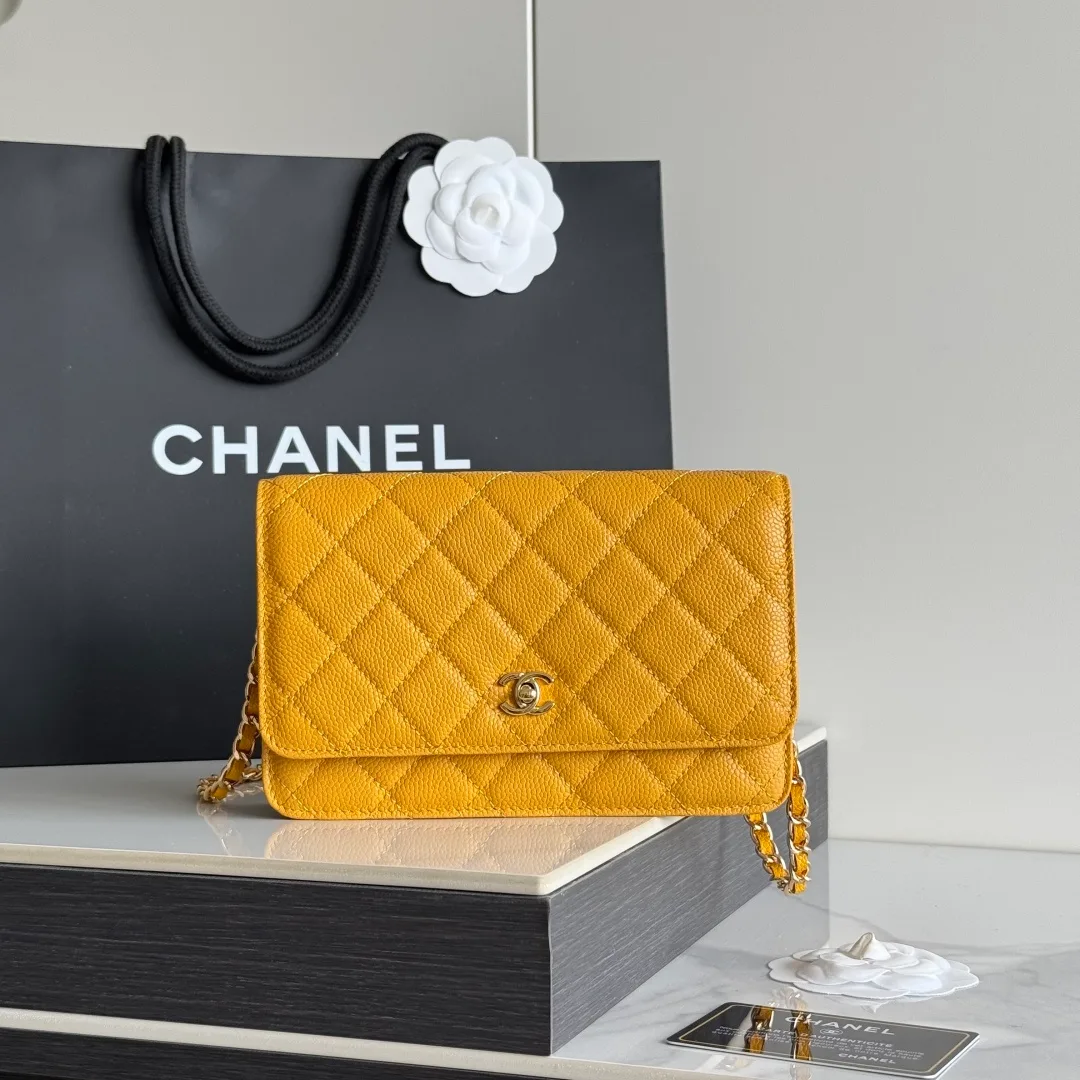 Chanel Calfskin Quilted Clutch in Yellow · view 1
