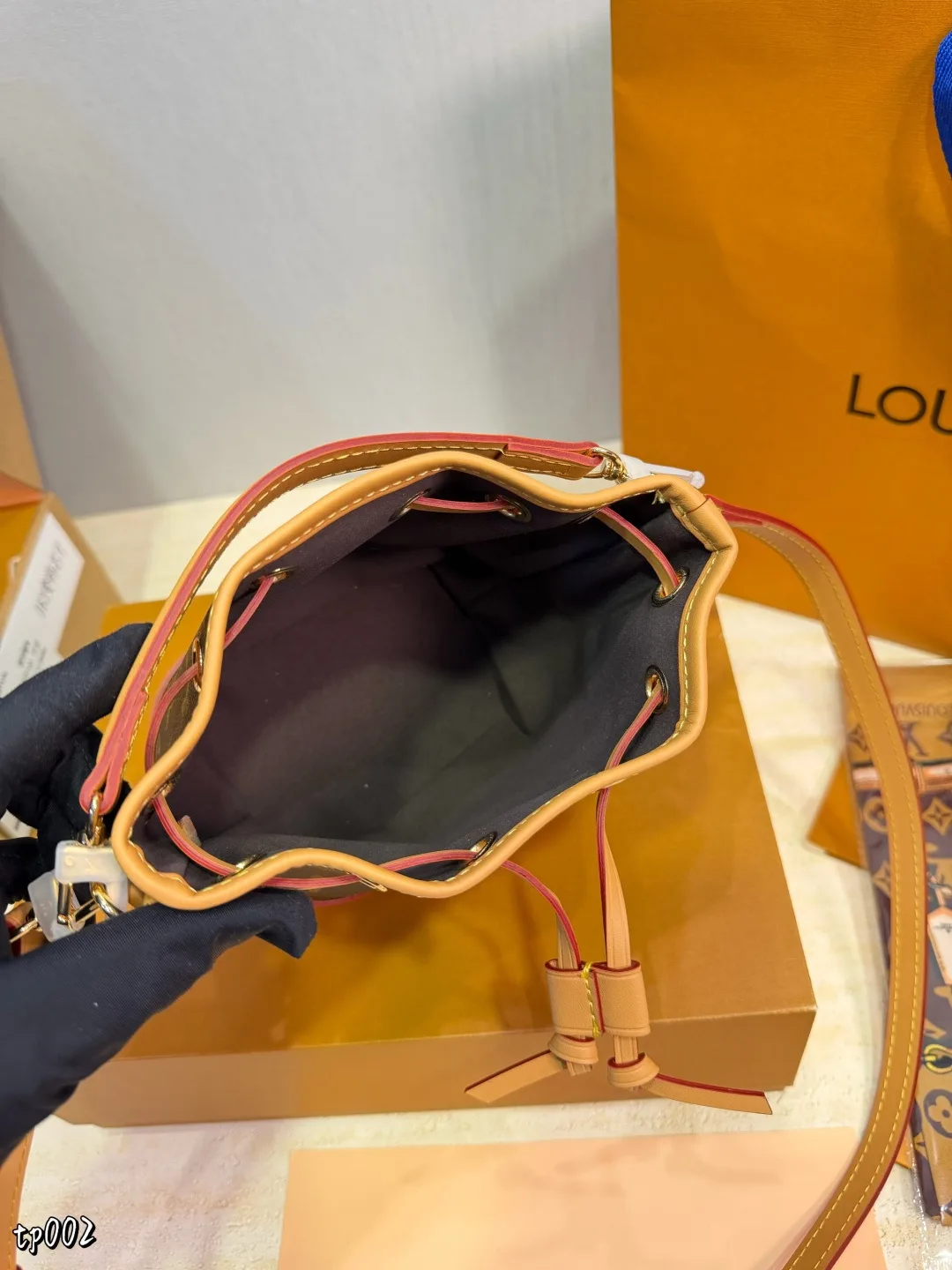 Louis Vuitton Nano Noe Bucket Bag in Brown · view 9