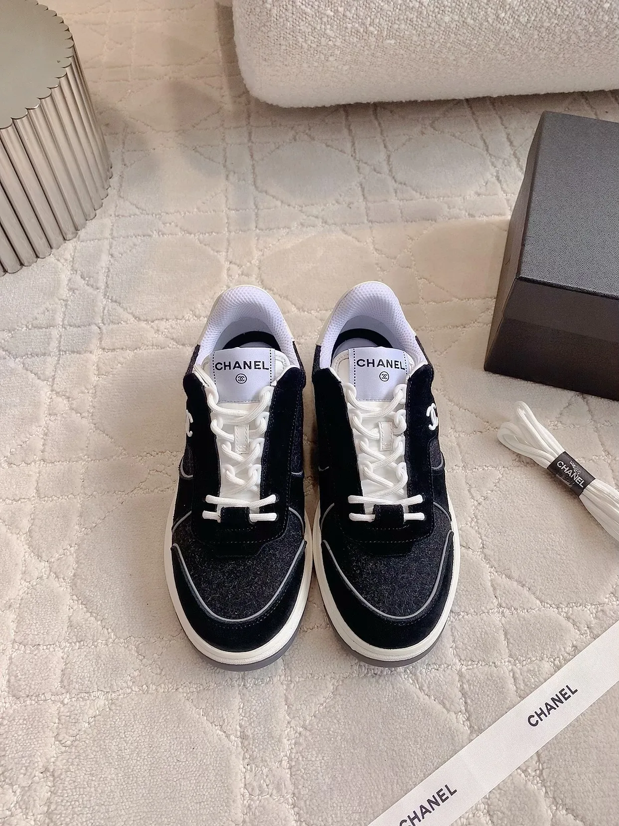 Chanel Cowhide Sneakers in Black · view 1