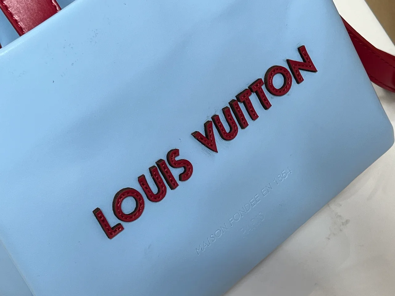 Louis Vuitton Cowhide Quilted Embroidered Tote in Blue · view 6