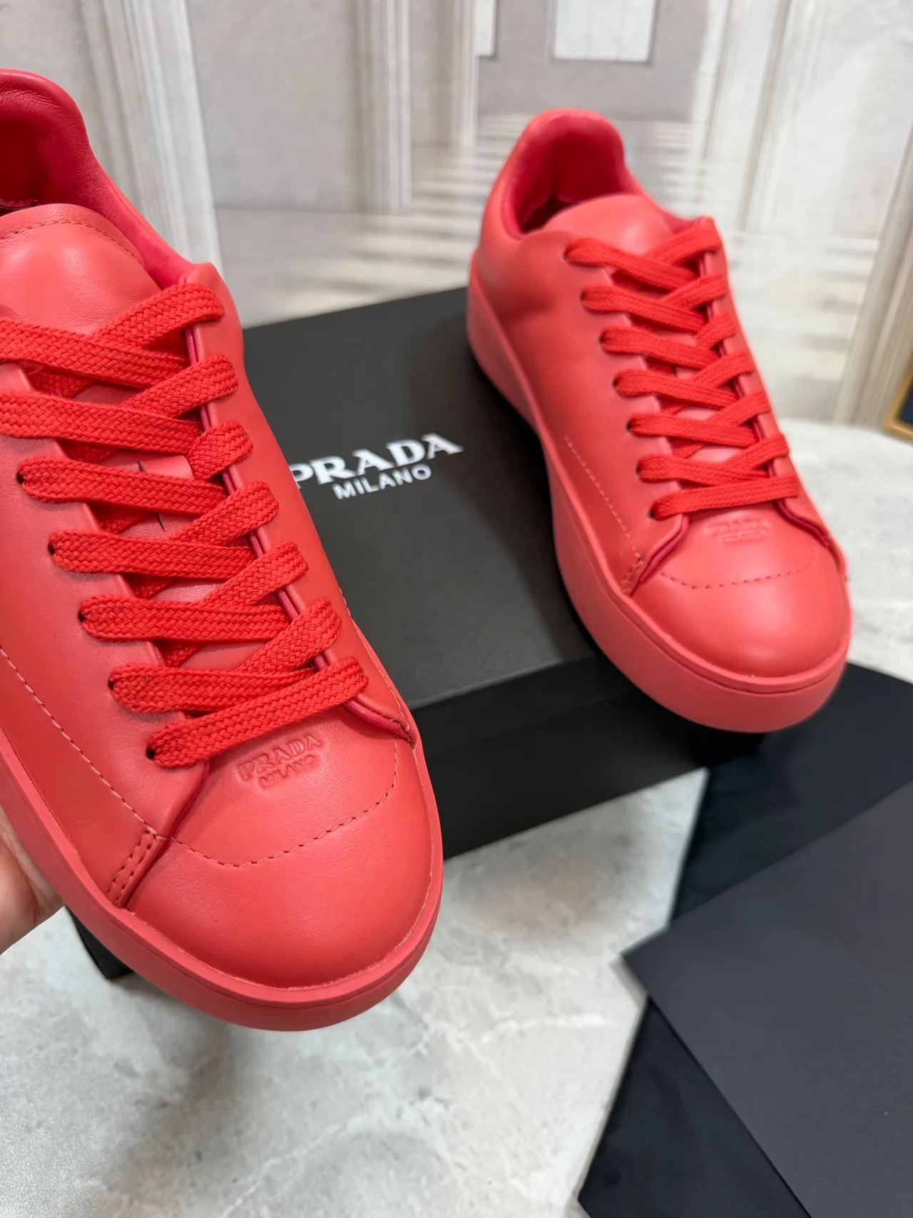 Prada Cowhide Round-Toe Low-Top Sneakers in Red · view 4
