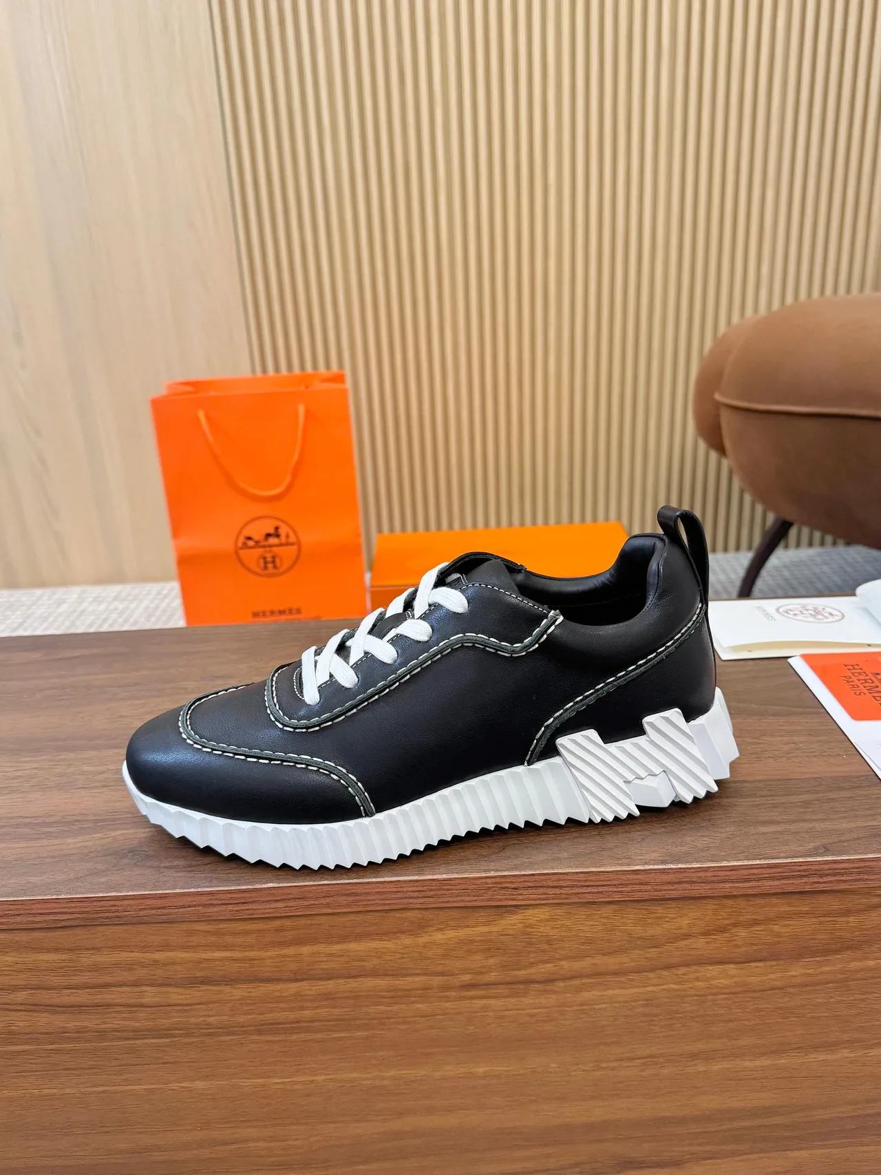 Hermes Smooth Round-Toe Sneakers in Black · view 1