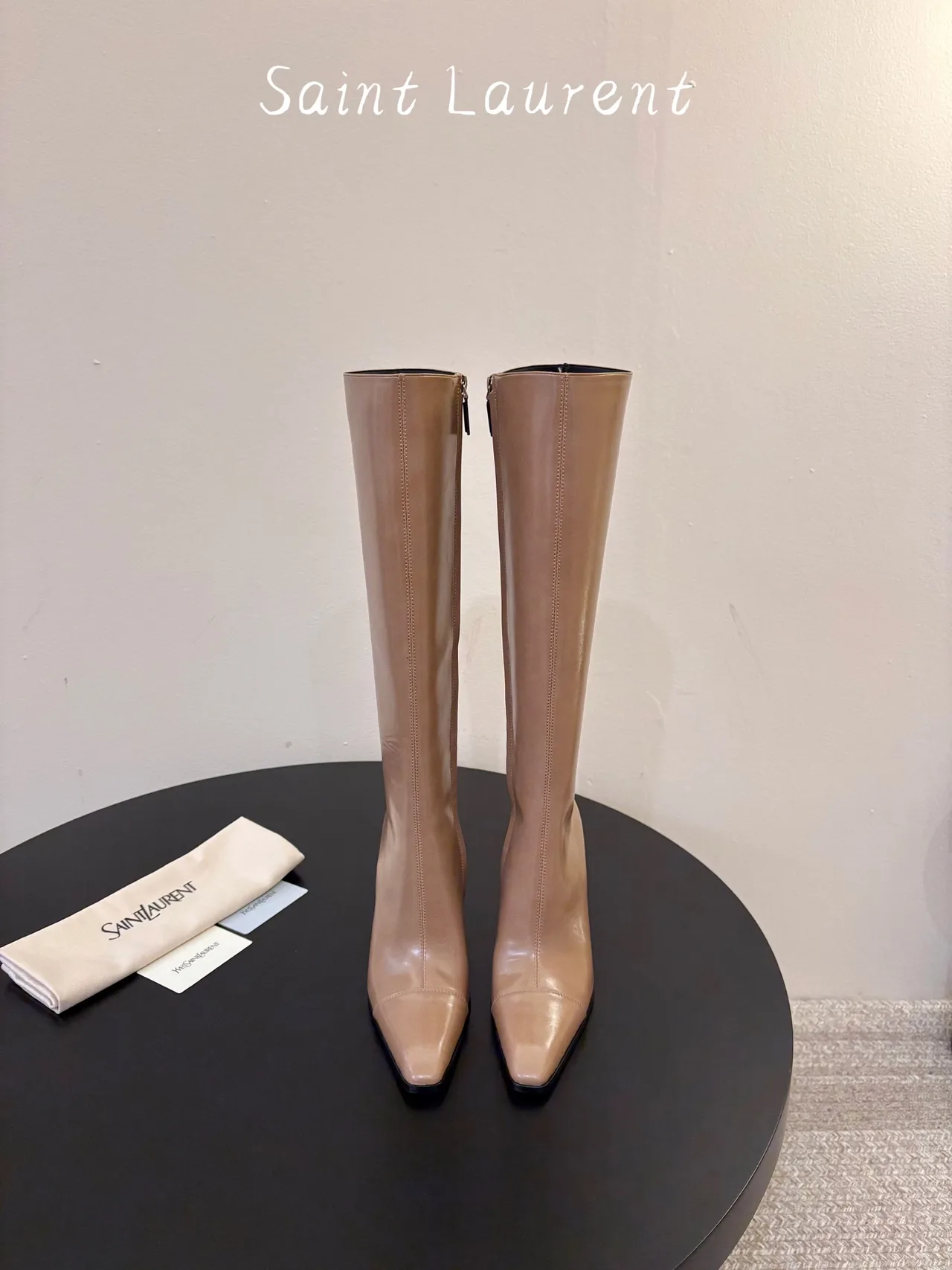 Saint Laurent Cowhide Sheepskin Glossy Pointed-Toe Knee-High Boots in Beige · view 1